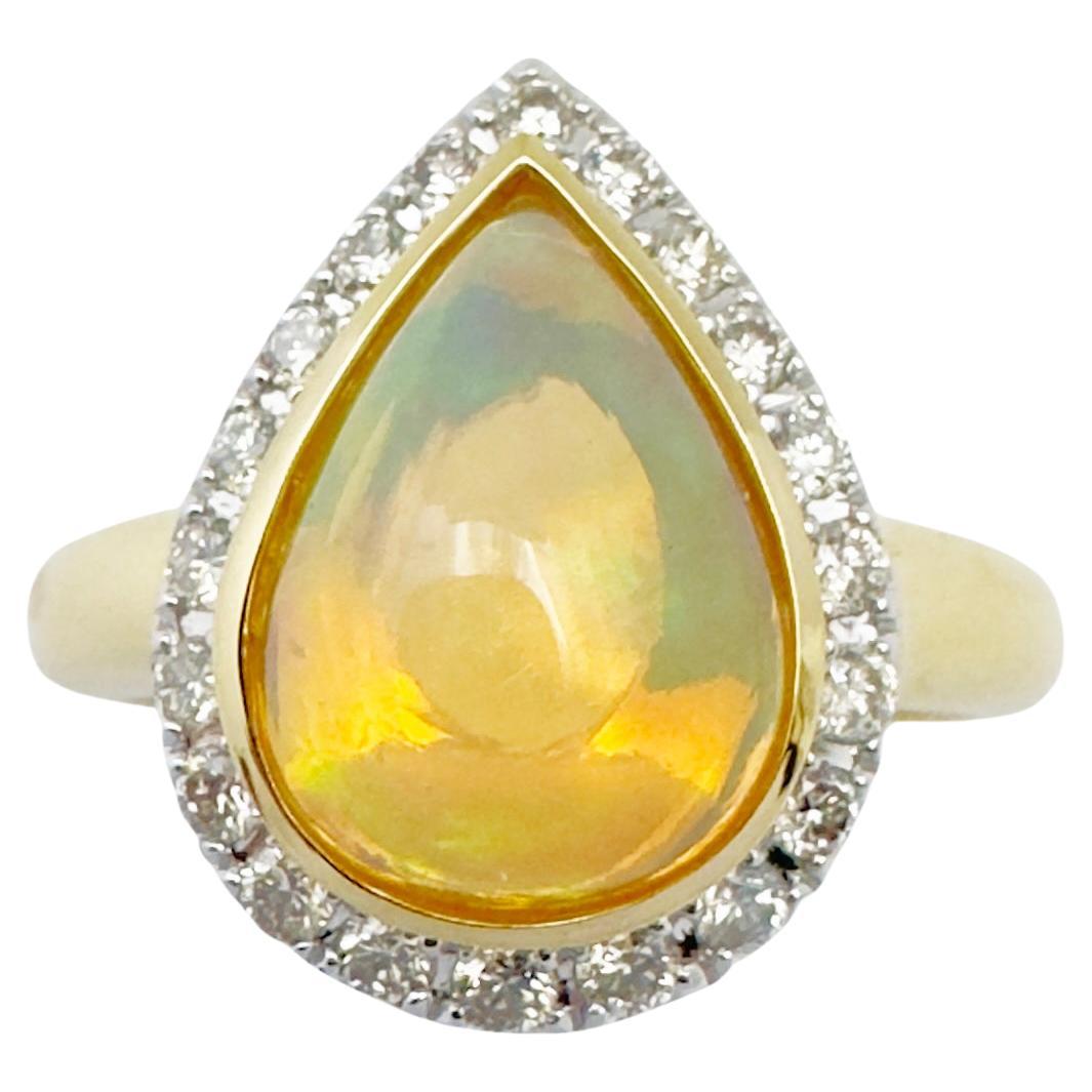 Opal with Diamond Ring set in 18K Gold Settings