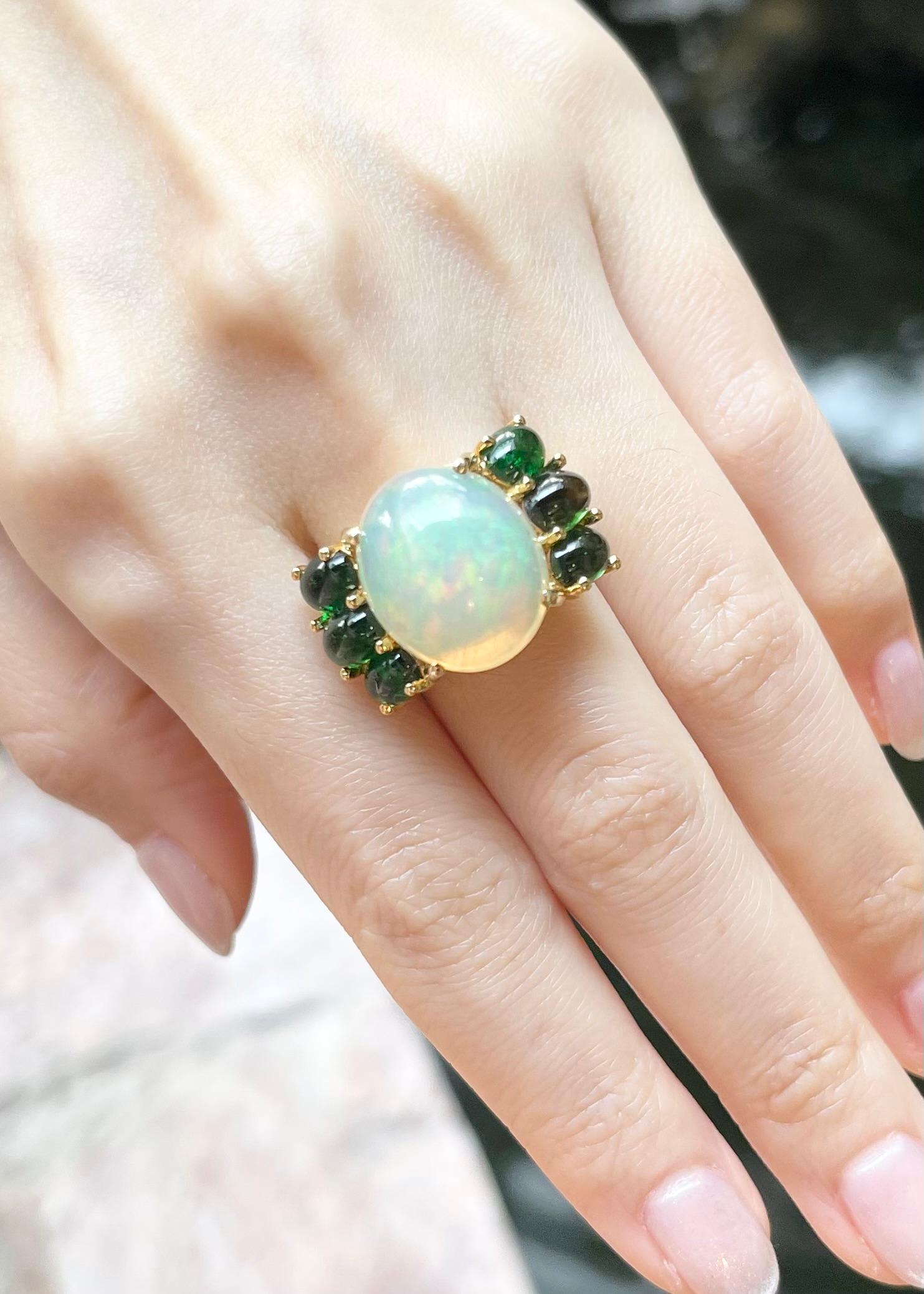 Cabochon Opal with Green Tourmaline Ring set in 18K Gold Settings For Sale