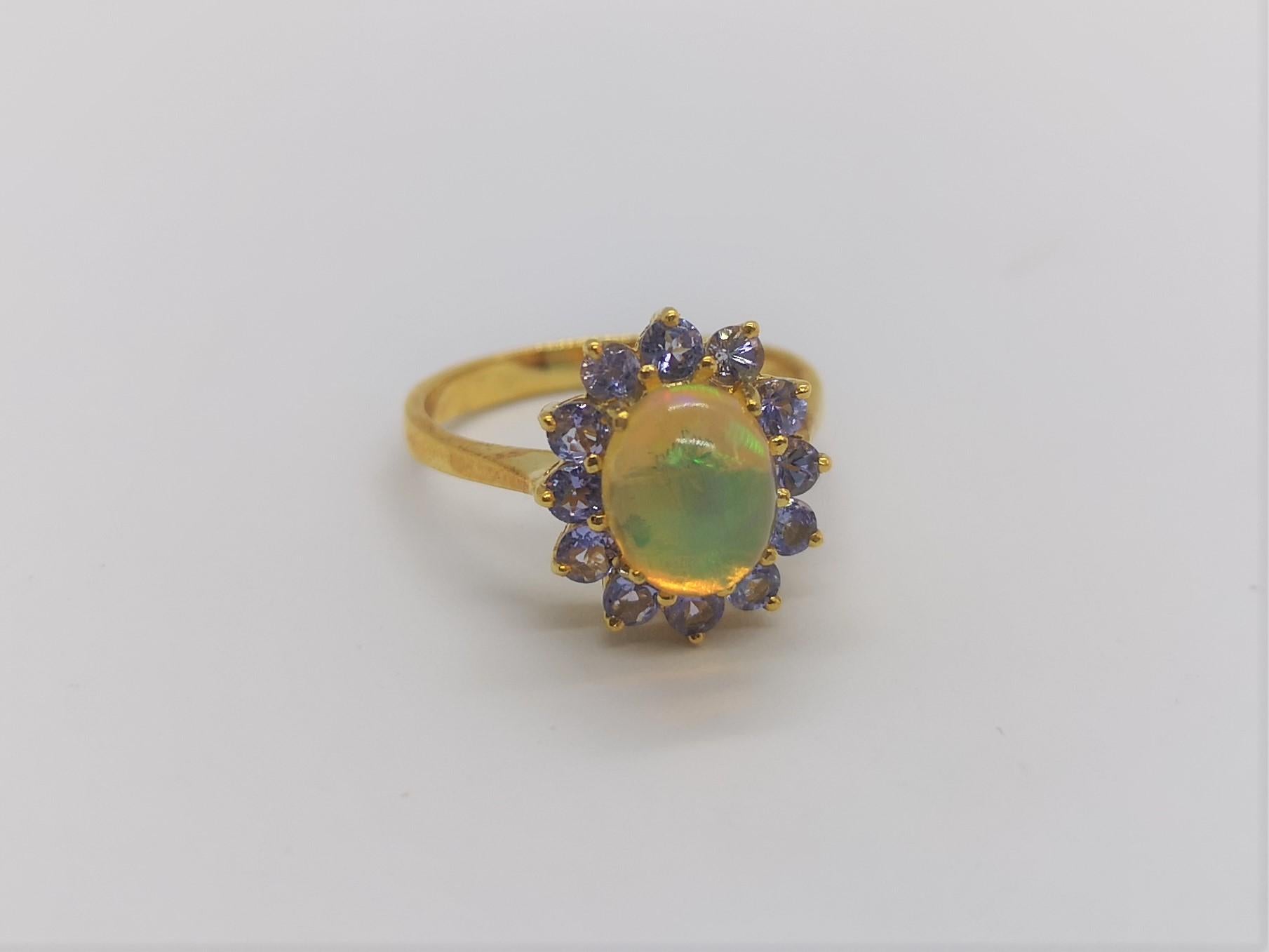 Opal with Tanzanite Ring Set in 18 Karat Gold Settings For Sale 11