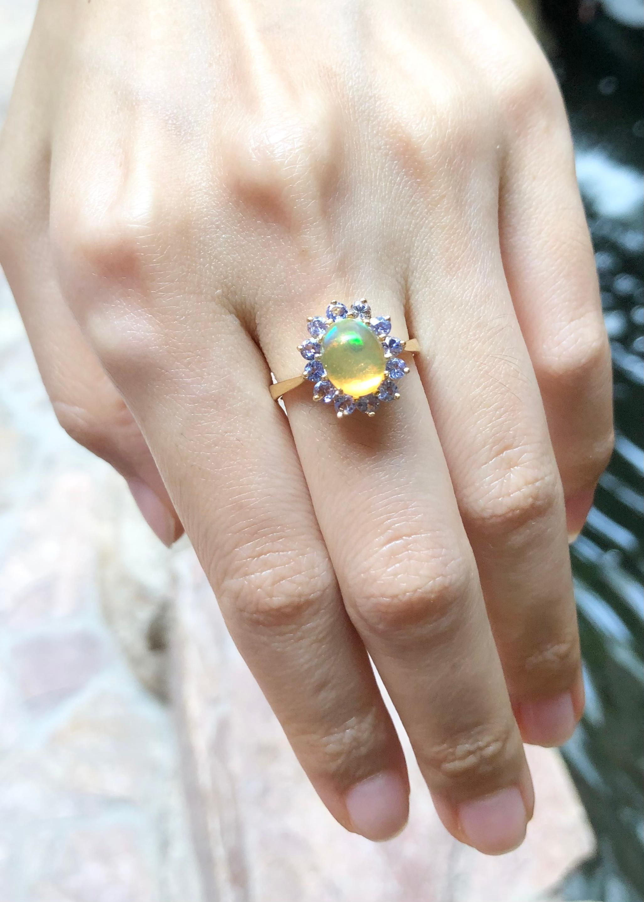 Contemporary Opal with Tanzanite Ring Set in 18 Karat Gold Settings For Sale