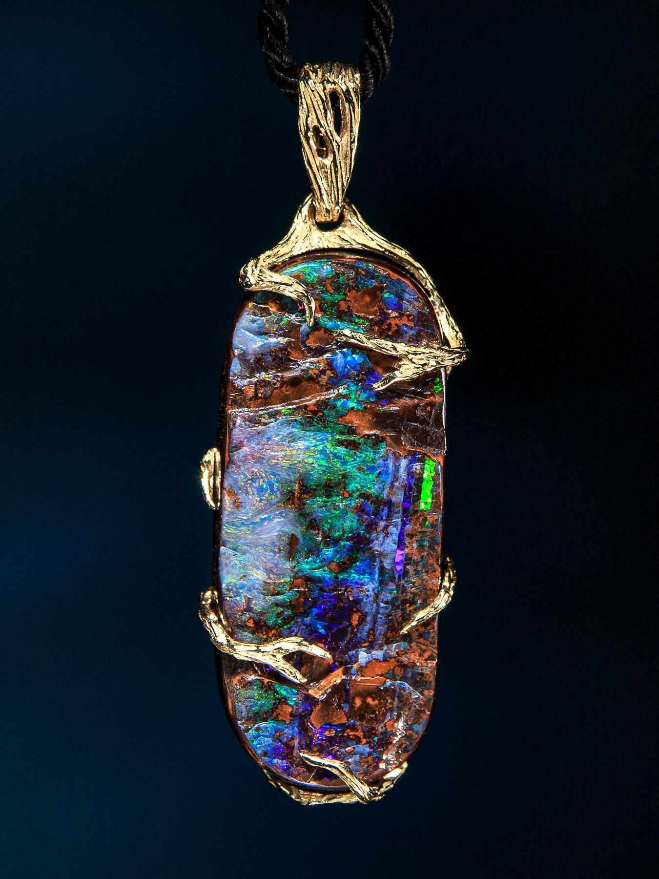 14K yellow gold necklace with natural boulder Opal
opal origin - Australia
opal measurements - 0.16 х 0.55 х 1.34 in / 4 х 14 х 34 mm
opal weight - 32 carats
pendant  weight - 10.79 grams 
pendant length - 1.85 in / 47.10 mm

Roots collection


We
