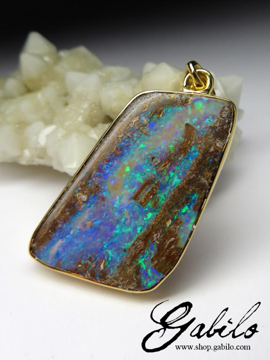 18K yellow gold pendant with natural boulder Opal

opal origin - Australia 

opal measurements - 0.079 х 0.63 х 1.06 in / 2 х 16 х 27 mm

stone weight - 8.6 carats

pendant length - 1.5 in / 38 mm

pendant weight - 4.10 grams

Minimal collection