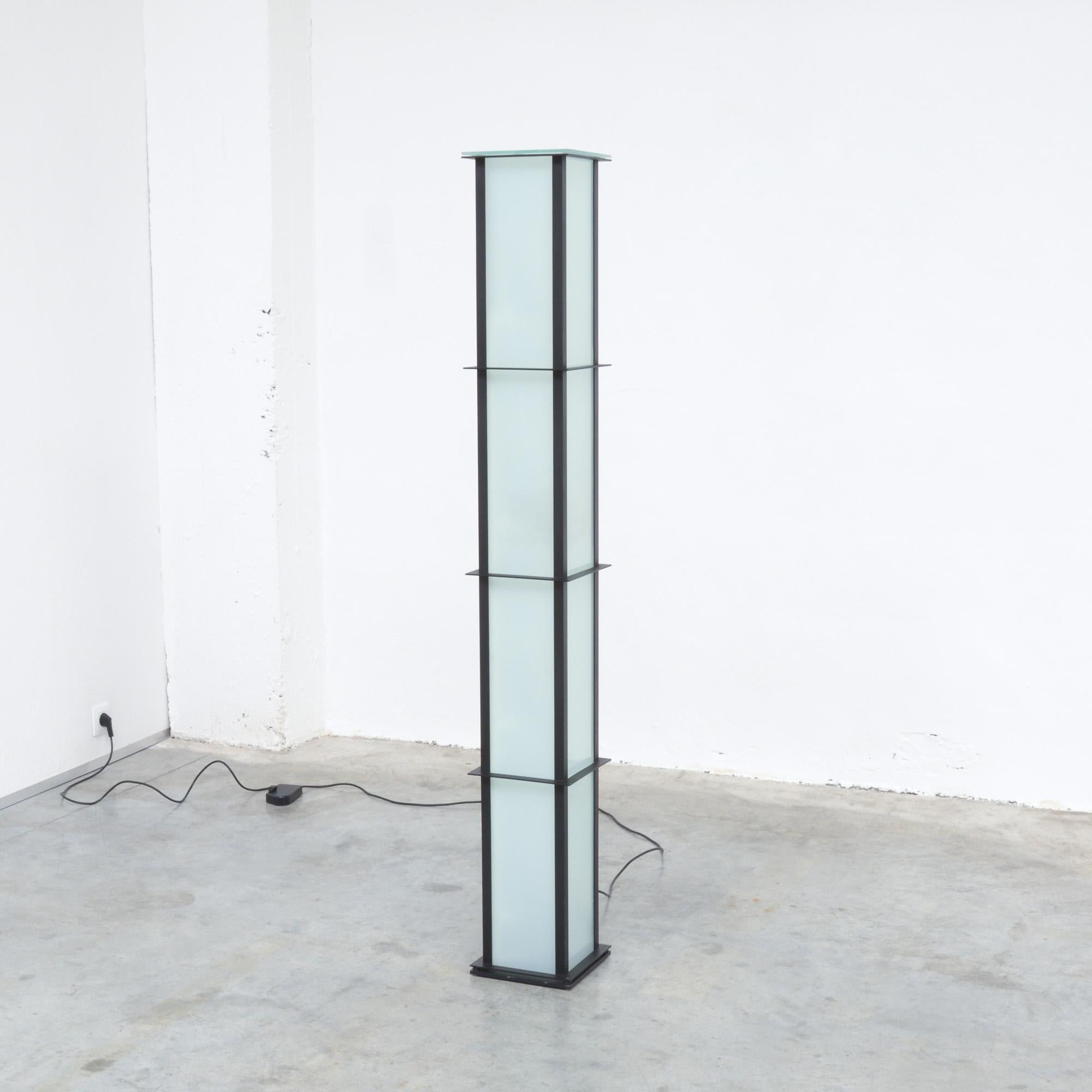 The Opale floor lamp was designed by Fabiaan Van Severen in 1990. It was produced in his own workshop between 1990 and 2005.
This Minimalist lamp was produced in 1997.
The lamp is made of black lacquered metal and translucent opale glass. It is