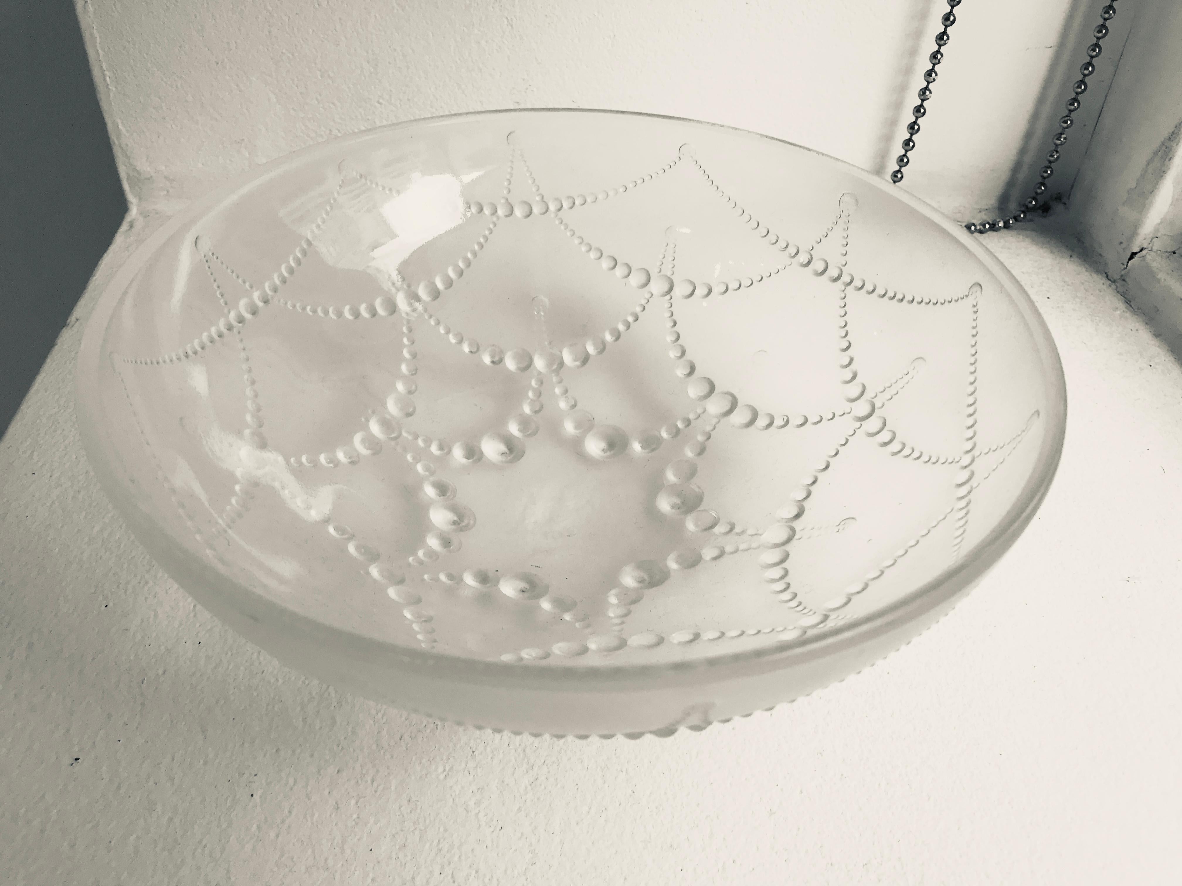 Opalescent mould glass bowl fruits pattern signed R. Lalique, France
acid stamped signature.