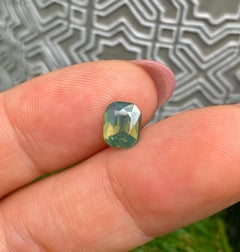 Opalescent Sapphire Yellowish Green 1.61Ct natural Unheated gemstone