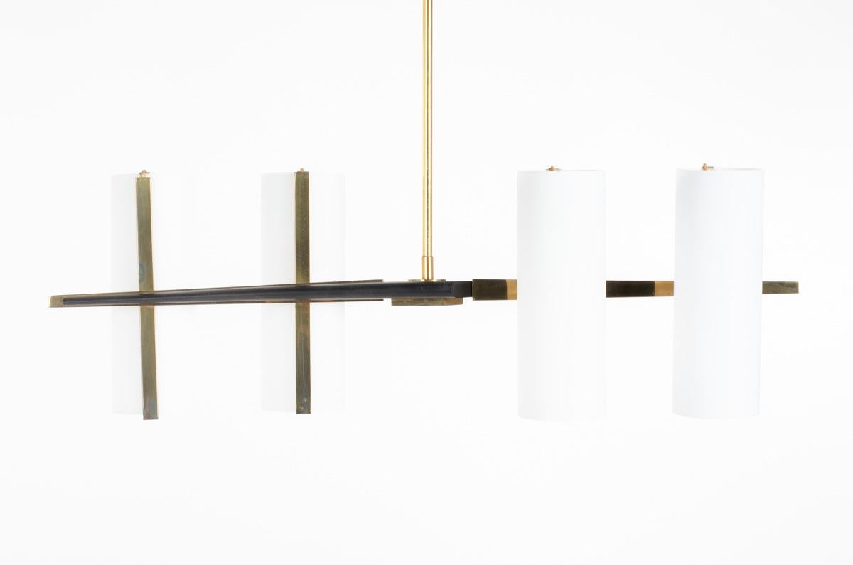 Pendant light in the style of Maison Arlur and Lunel
Made in the sixties in France
Black metal structure, 4 reflectors in opaline glass, brass parts
