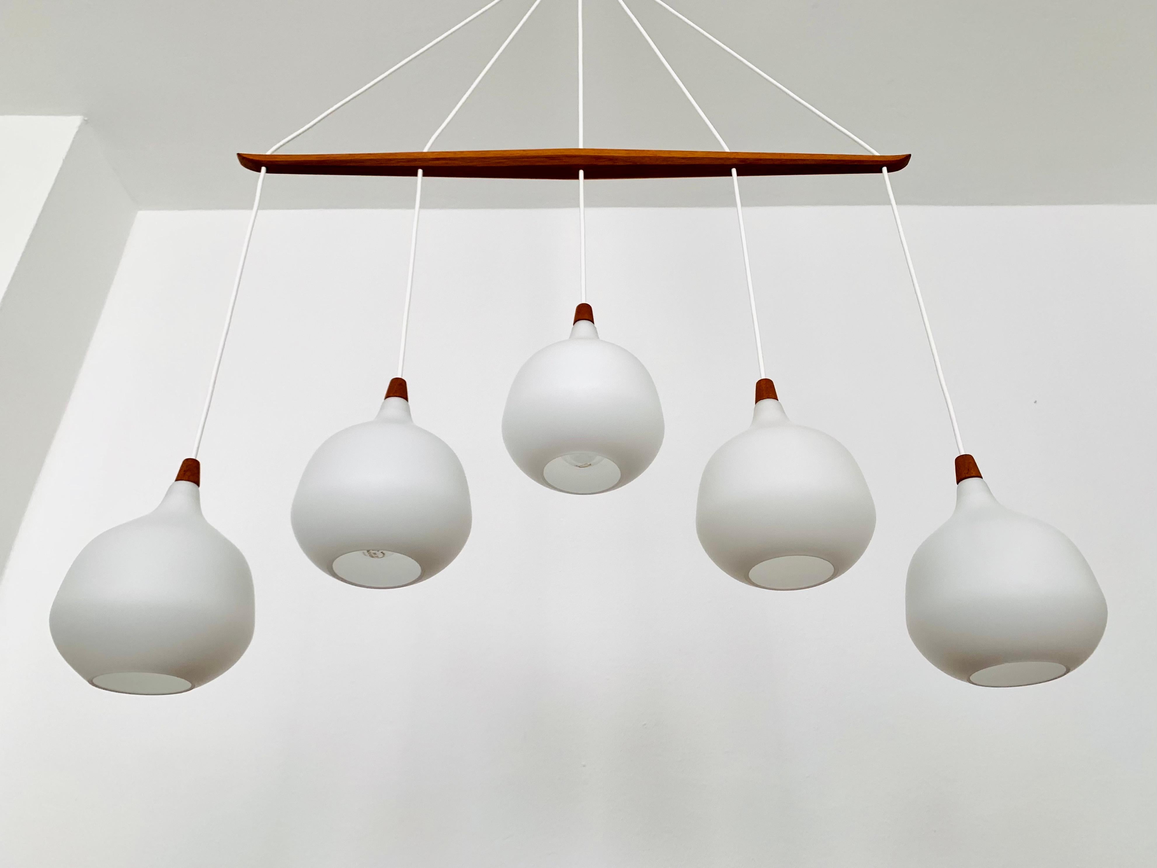 Mid-20th Century Opaline and Teak Chandelier by Uno and Östen Kristiansson for Luxus For Sale