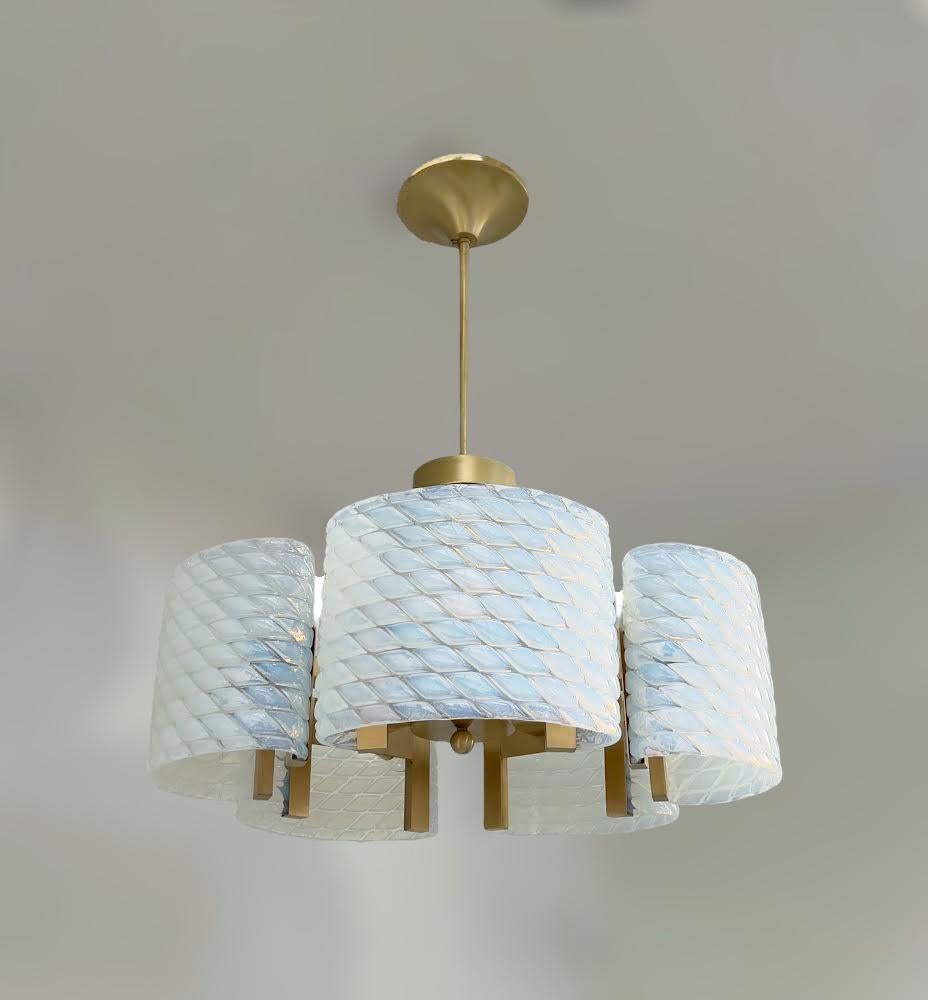 Italian chandelier with opaline Murano glass shades hand blown in stylish diamond shape patterns and textured effect, mounted on solid brass frame in satin brass finish, designed by Fabio Bergomi for Fabio Ltd / Made in Italy
10 lights / E12 or E14