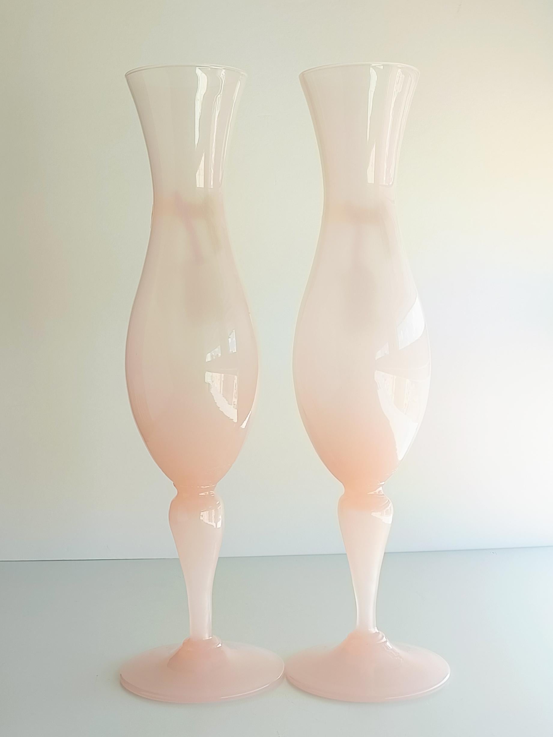 Beyond elegant large pearly translucent real opal Empoli glass labelled Opalina Florentina Cup-Vases.

These vases were stocked by decades (since the 1950s) in the basement of a glass and porcelain gifts shop in Florence until recently - the venue