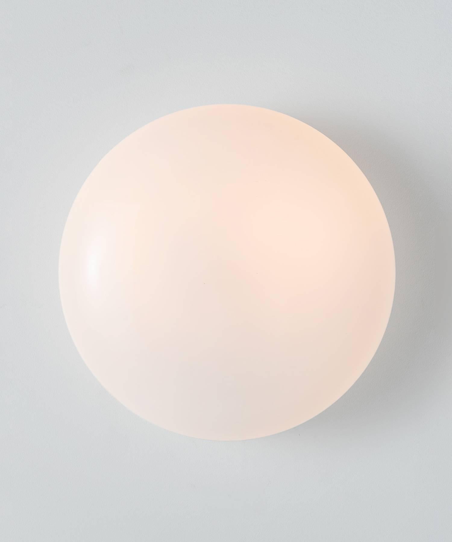 Opaline flush mount, circa 1940

Elegant form suitable for wall or ceiling mounting.
