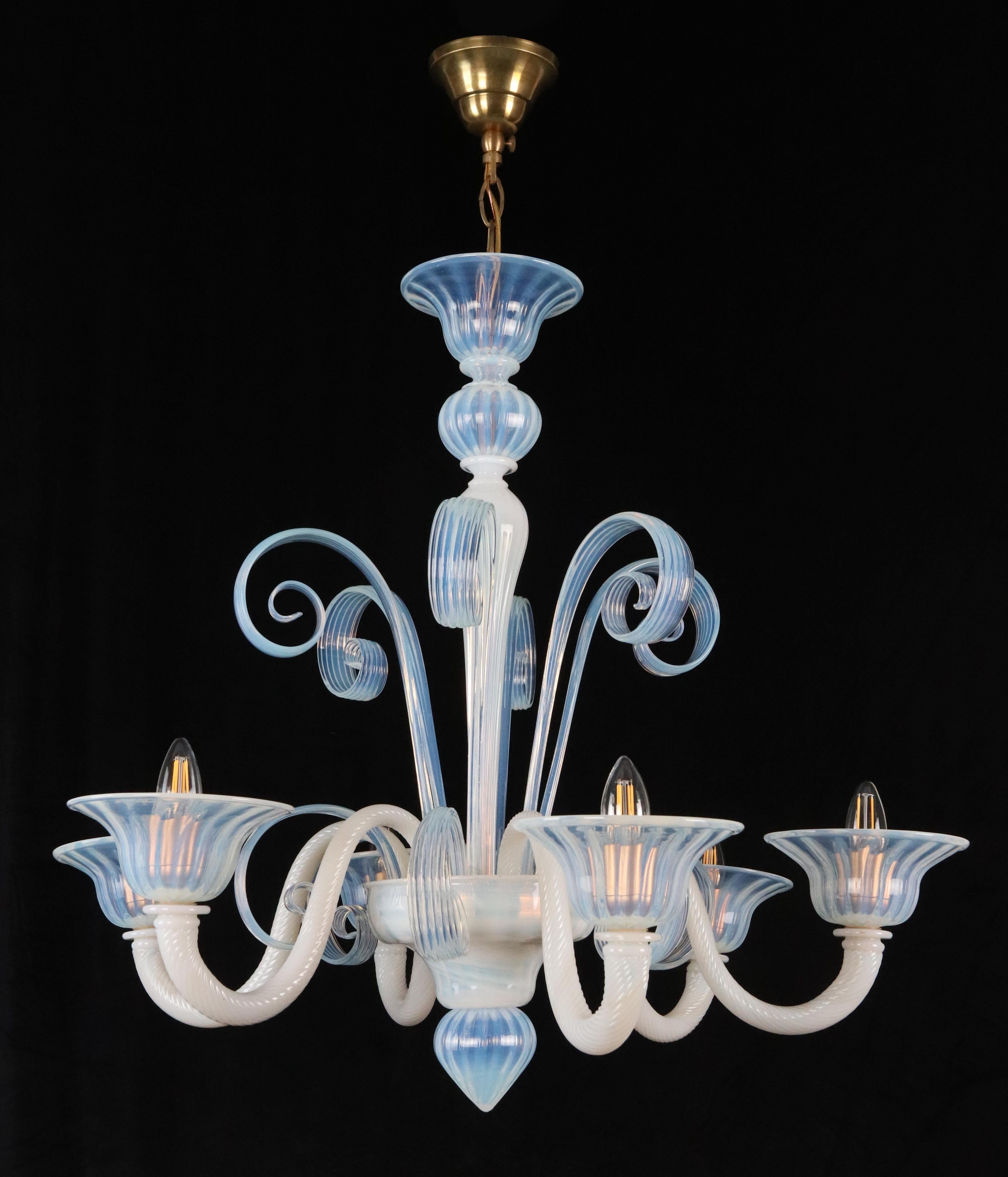  Murano opaline glass six arm chandelier with curls that flow upward and downward. This takes six Edison style bulbs. Good condition. Cleaned and restored. Ships disassembled. One available. Please note, this item is located in our NYC location.