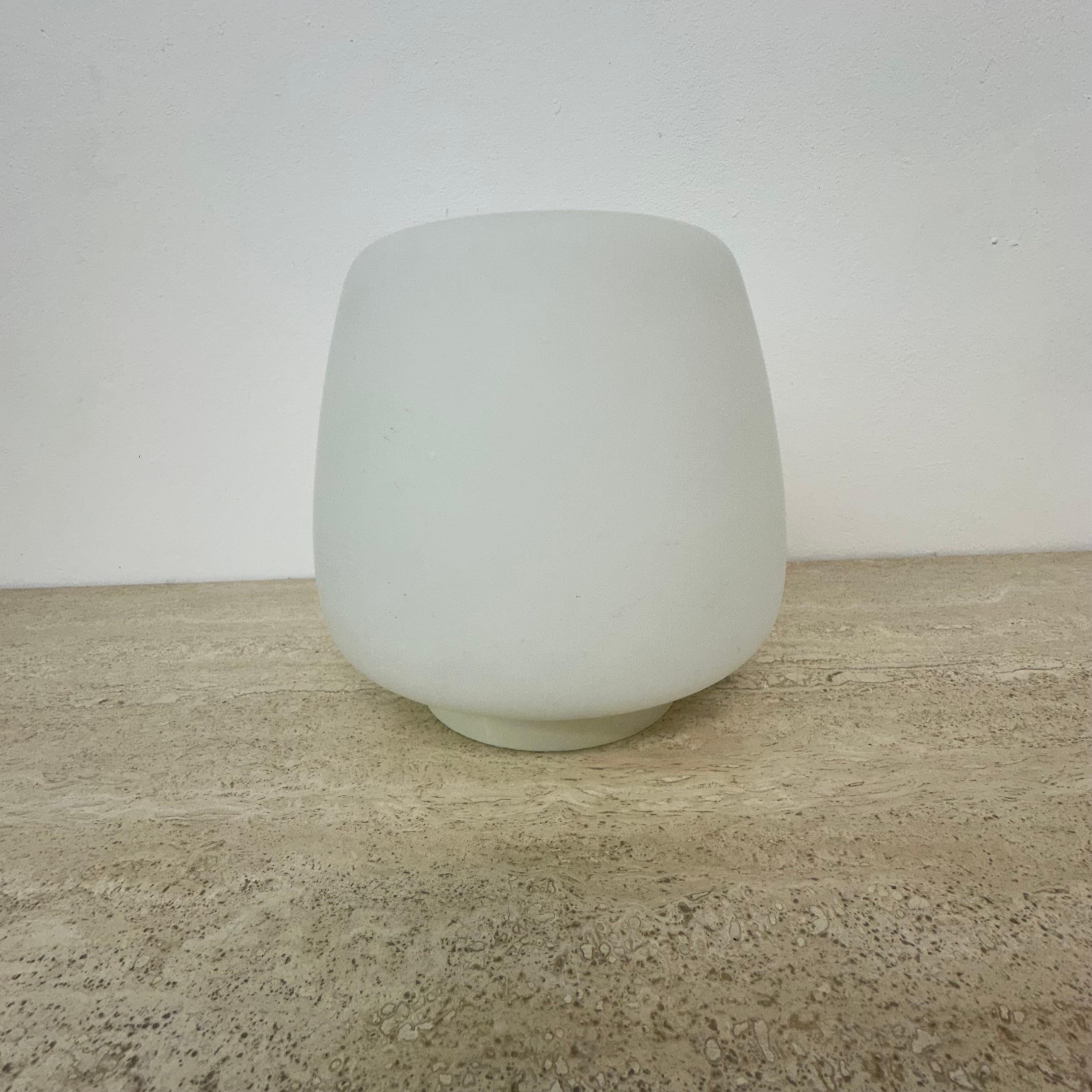 Opaline glass art deco bauhaus ceiling lamp , 1930s the Netherlands

Dimensions:19,5cm Height , 19cm Diameter
Period: 1930s
Origin: the Netherlands
Material: Glass , plastic