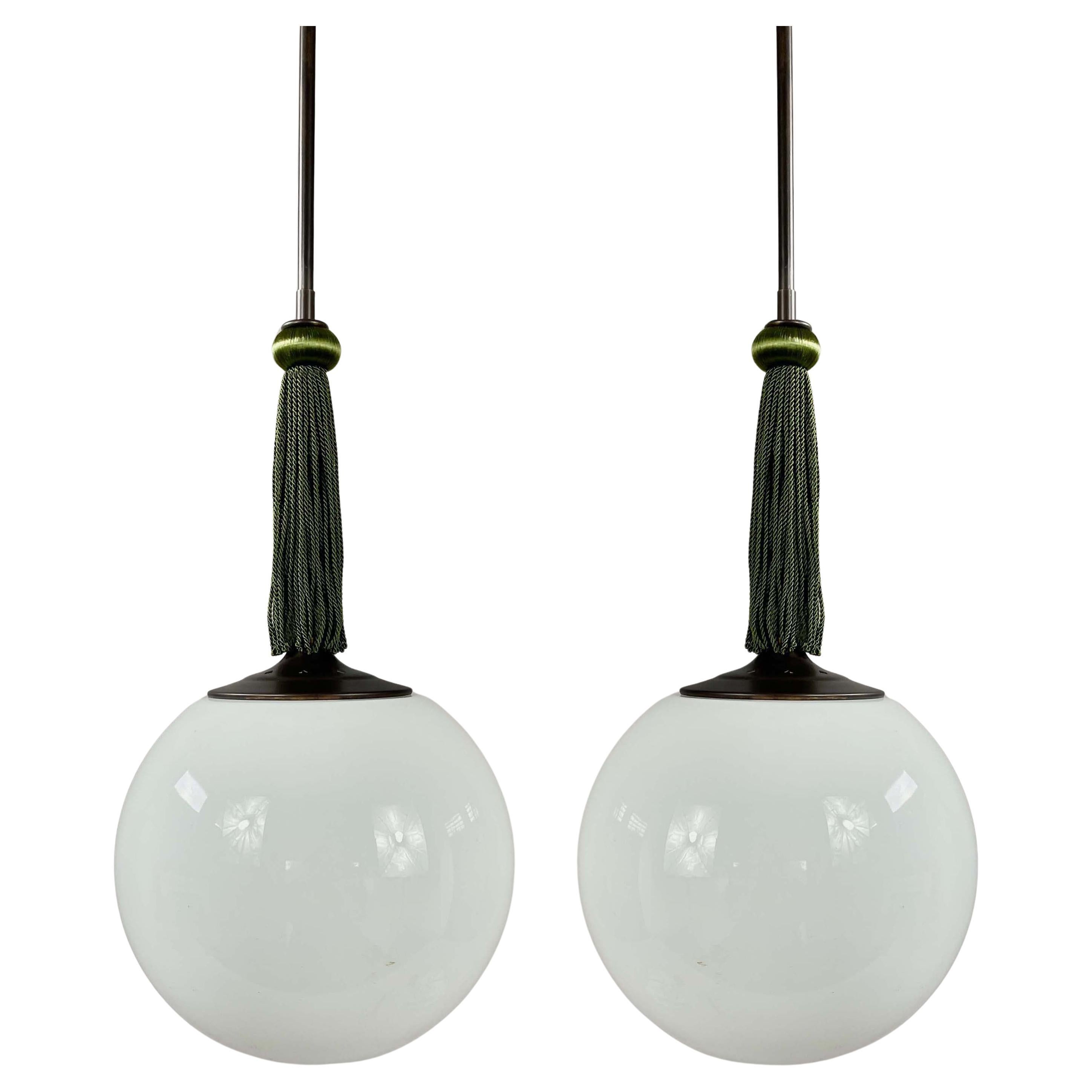 Opaline Glass 
Burnished Brass Ball Pendant with Tassel, Germany 1930s