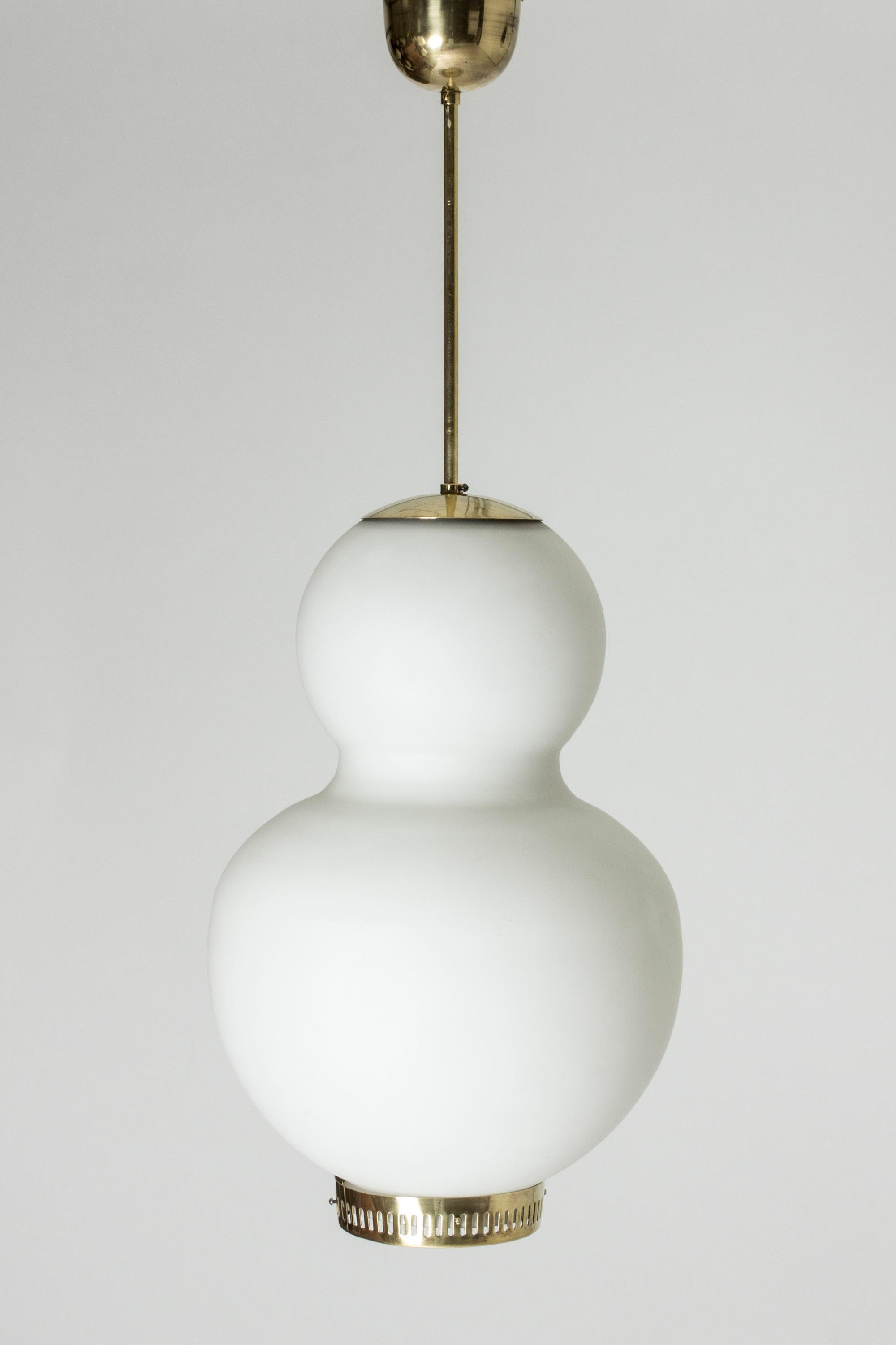 Beautiful Danish modern opaline glass and brass ceiling light by Bent Karlby. Streamlined bulbous form with a slim waist. Brass details at the top and the bottom.