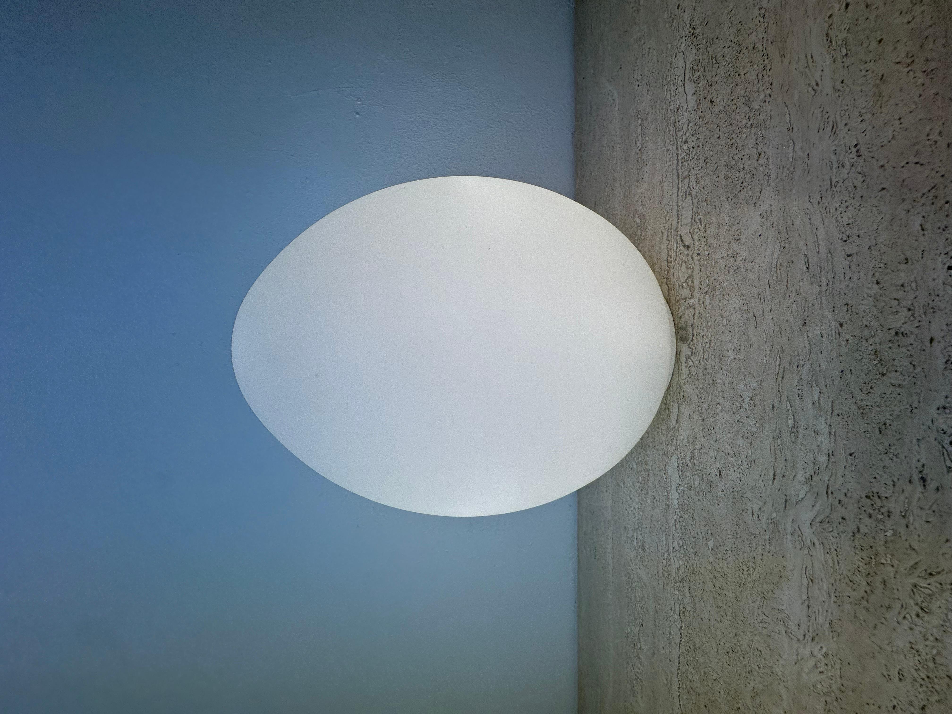 Opaline glass egg shaped table lamp , 1970s

Dimensions: 27cm Height , 20cm Diameter
Condition: Good
Period: 1970s
Material: Glass
Color White