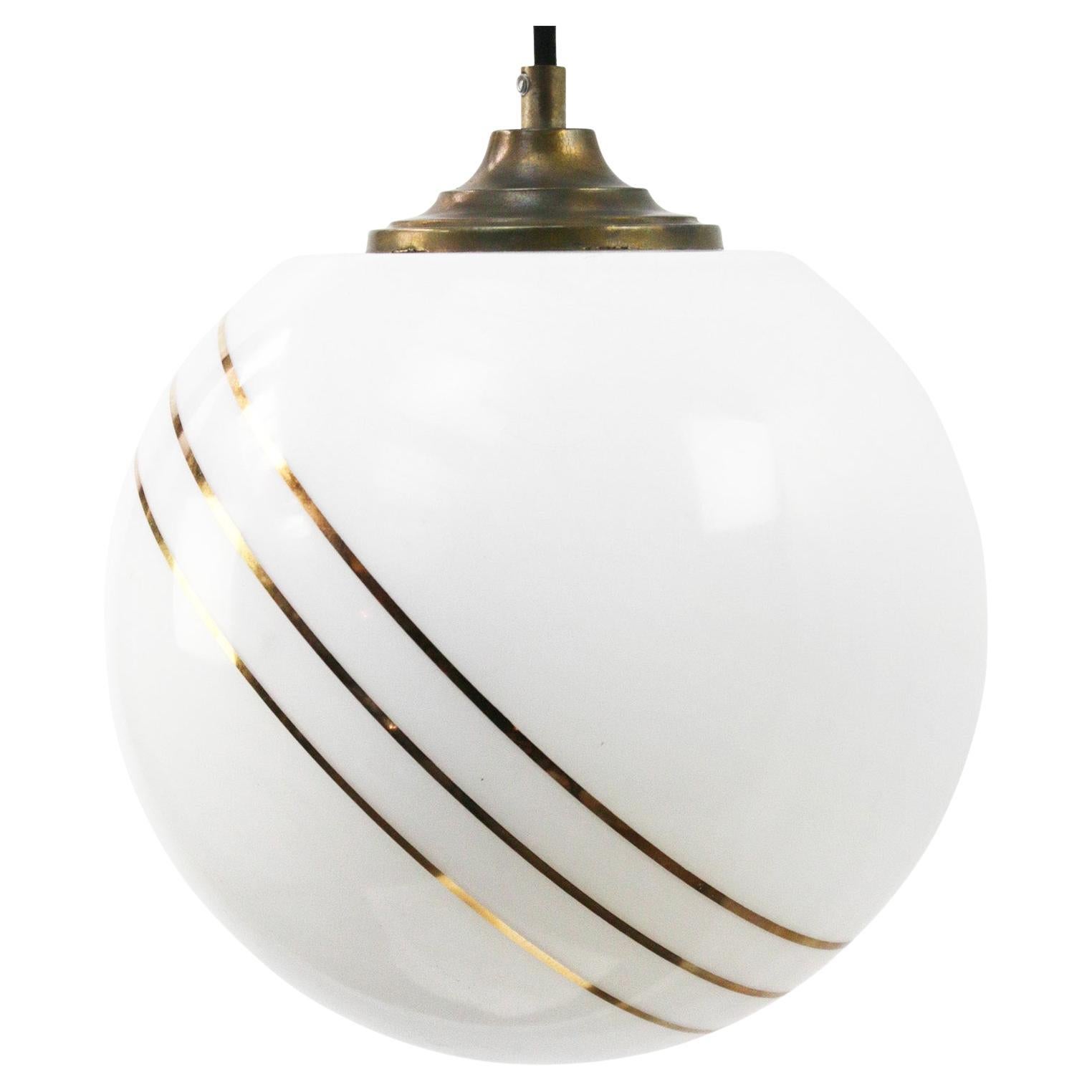 Opaline glass 25 Trois D’or pendant
2 meter black cotton flex
brass top

Weight: 2.00 kg / 4.4 lb

Priced per individual item. All lamps have been made suitable by international standards for incandescent light bulbs, energy-efficient and LED