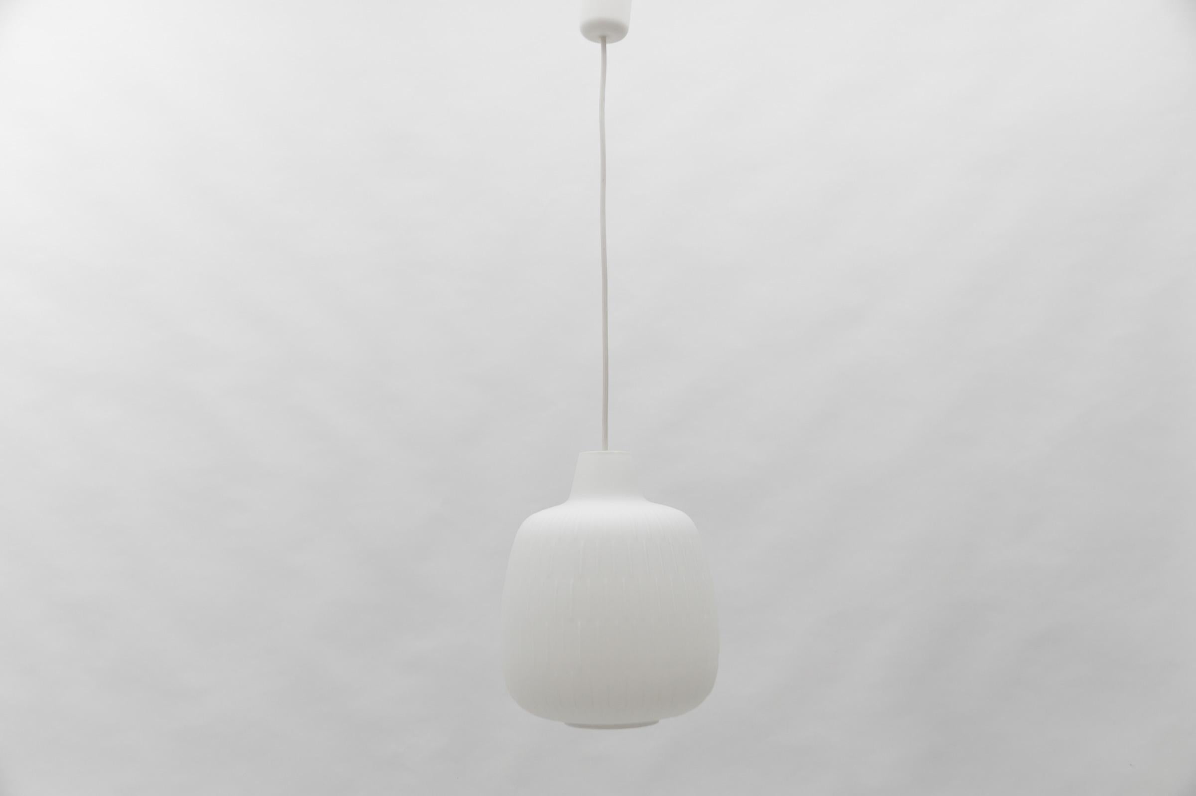 Ceiling Lamp by Aloys F. Gangkofner for Peill & Putzler, Germany Düren, 1960s.

1 x E27 Edison screw fit bulb holder, is rewired and in working condition. It runs both on 110/230 Volt.