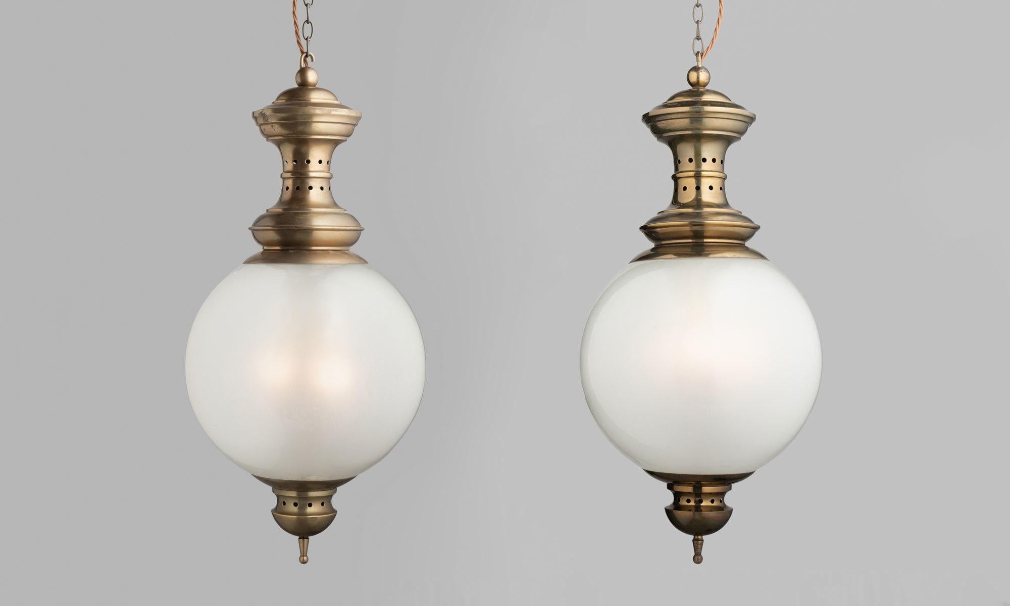 Opaline glass lantern by Luigi Caccia Dominioni for Azucena, Italy, circa 1950.

Elegant form with beautiful patinated brass fitters, one with a glossier finish and the other with more of a matte finish.

Measures: 10.75