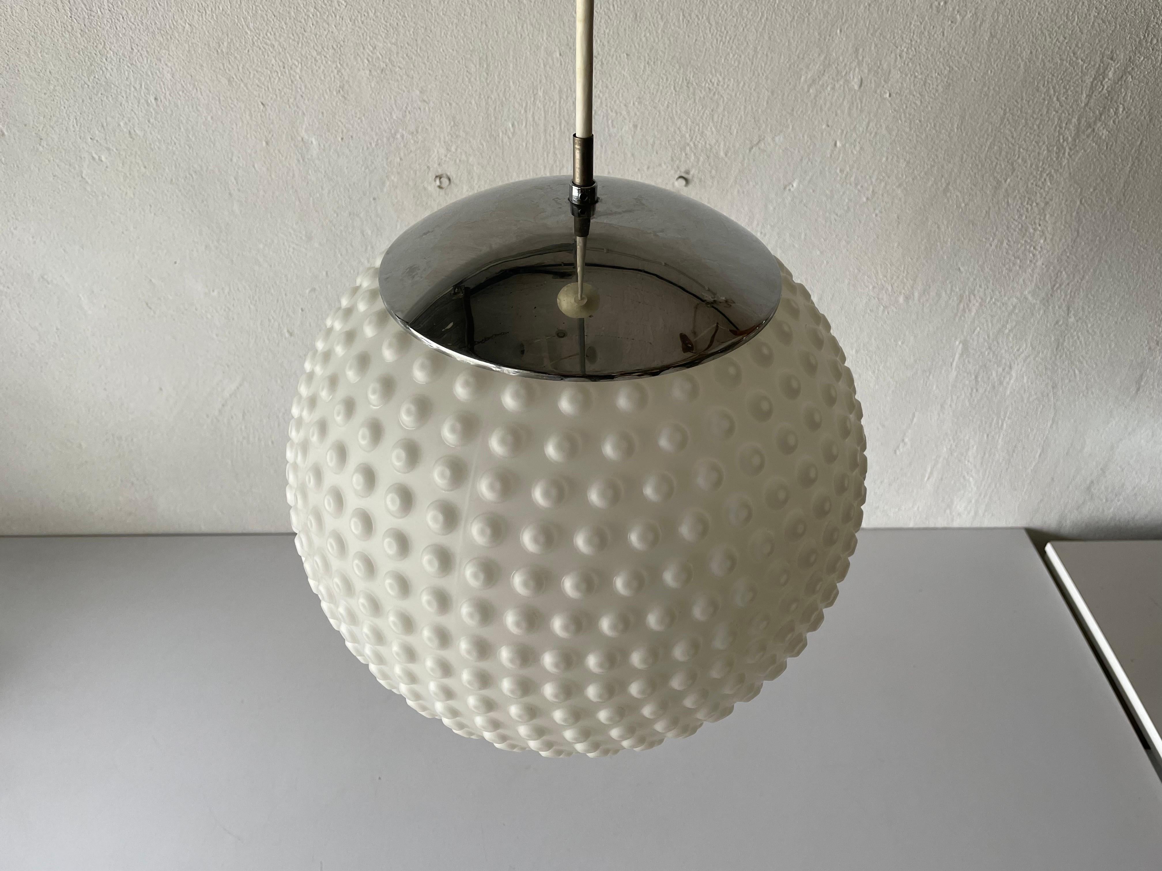Opaline glass pendant lamp by Rolf Krüger for Staff, 1970s, Germany

There are atomic dots on the lampshade.

Lampshade is in good condition and very clean. 

This lamp works with E27 light bulb. Max 100W
Wired and suitable to use with 220V