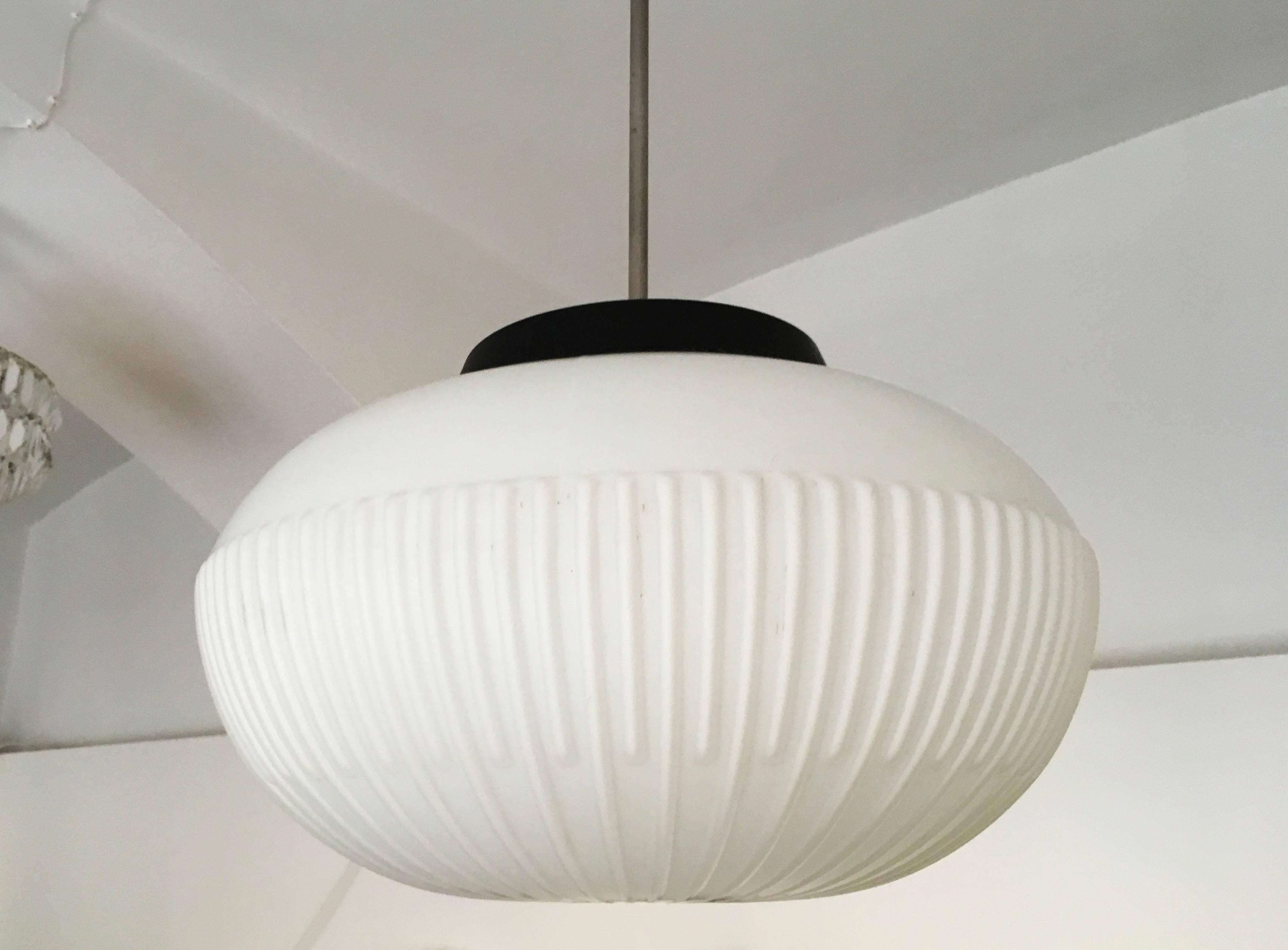 Opaline sphere shade with ridged side made in the 1970s.
Upto 6 pieces available.
 