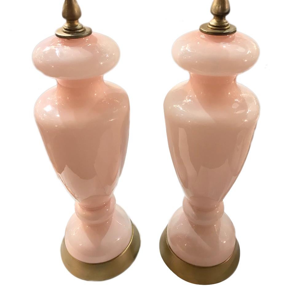 Pair of circa 1920s French pink opaline glass table lamps with gilt bases. 

Measurements:
Height of body: 16.5