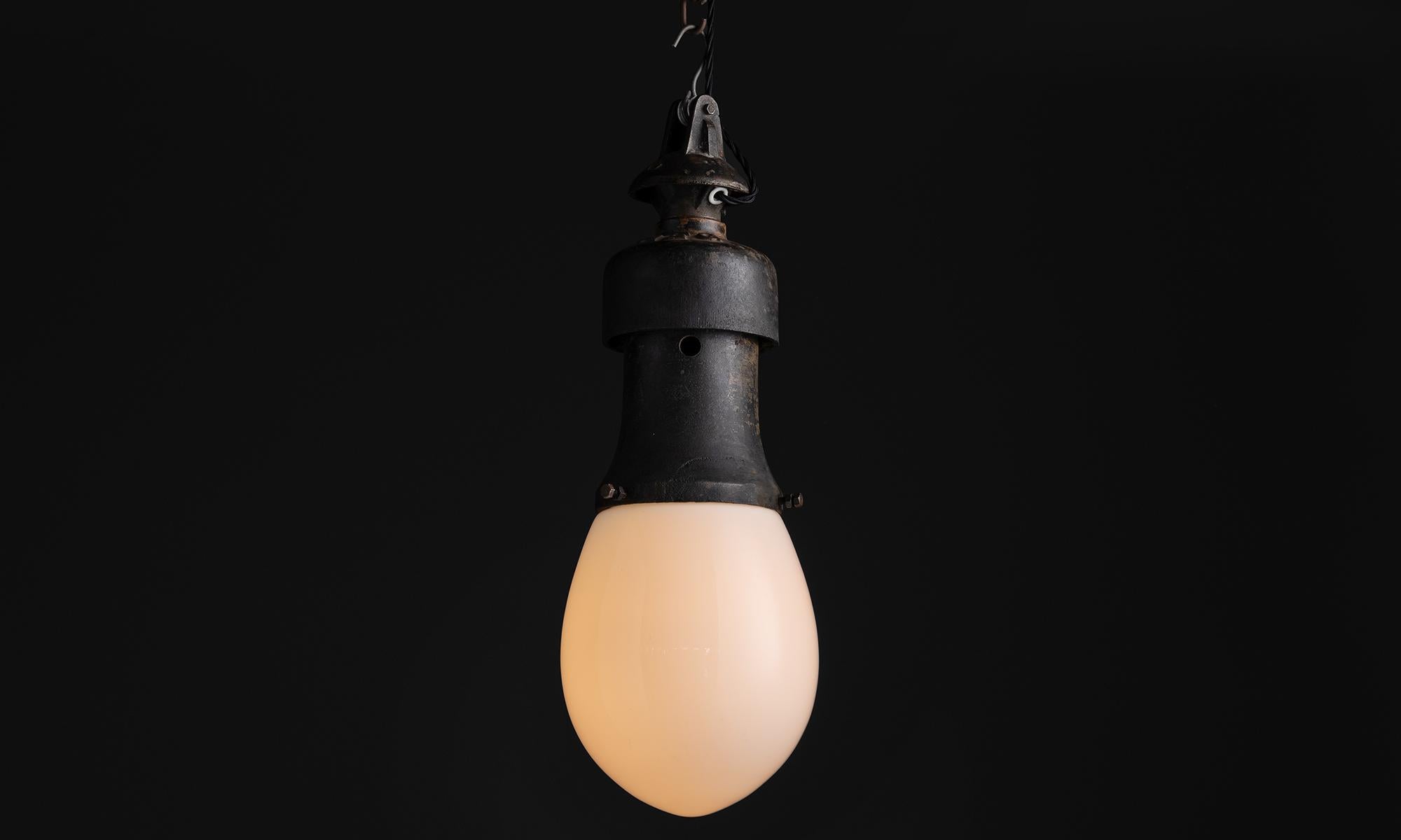 Industrial Opaline & Iron Pendant by AEG, Germany circa 1920 For Sale