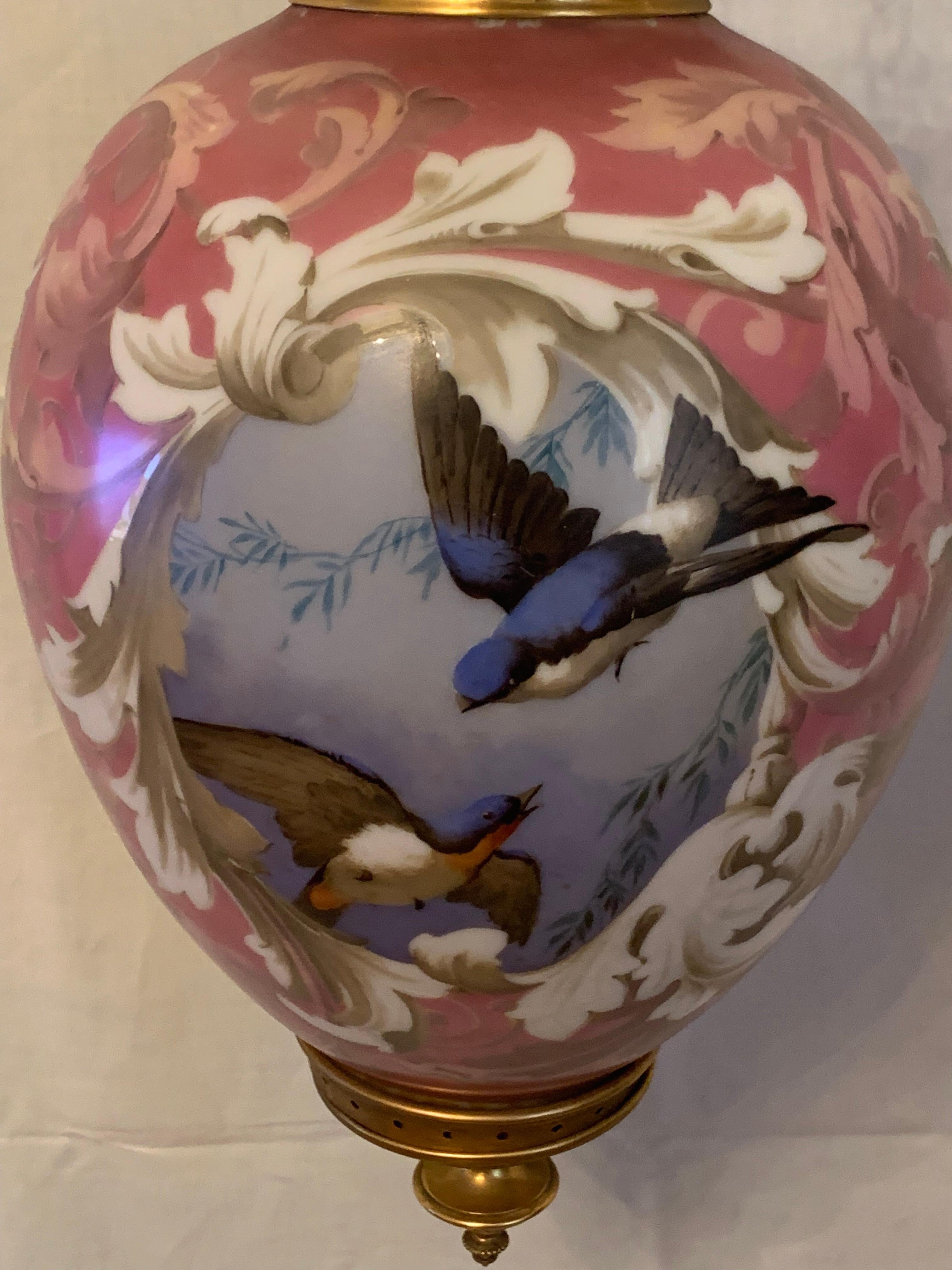 Opaline pink lantern with bronze style Napoleon III. This lantern is part of the high
French decoration decorated and hand painting. These colors for this lantern are incredibly intense. These bird decoration are execptional.