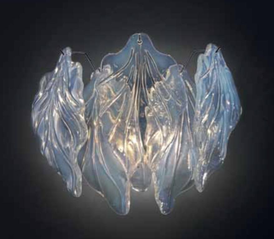 Italian wall light shown with iridescent opaline Murano glass leaves mounted on chrome finish metal frame / inspired by Mazzega Made in Italy
Measures: width 14 inches, height 14 inches
2 lights / E12 or E14 type / max 40W each
Order only / this