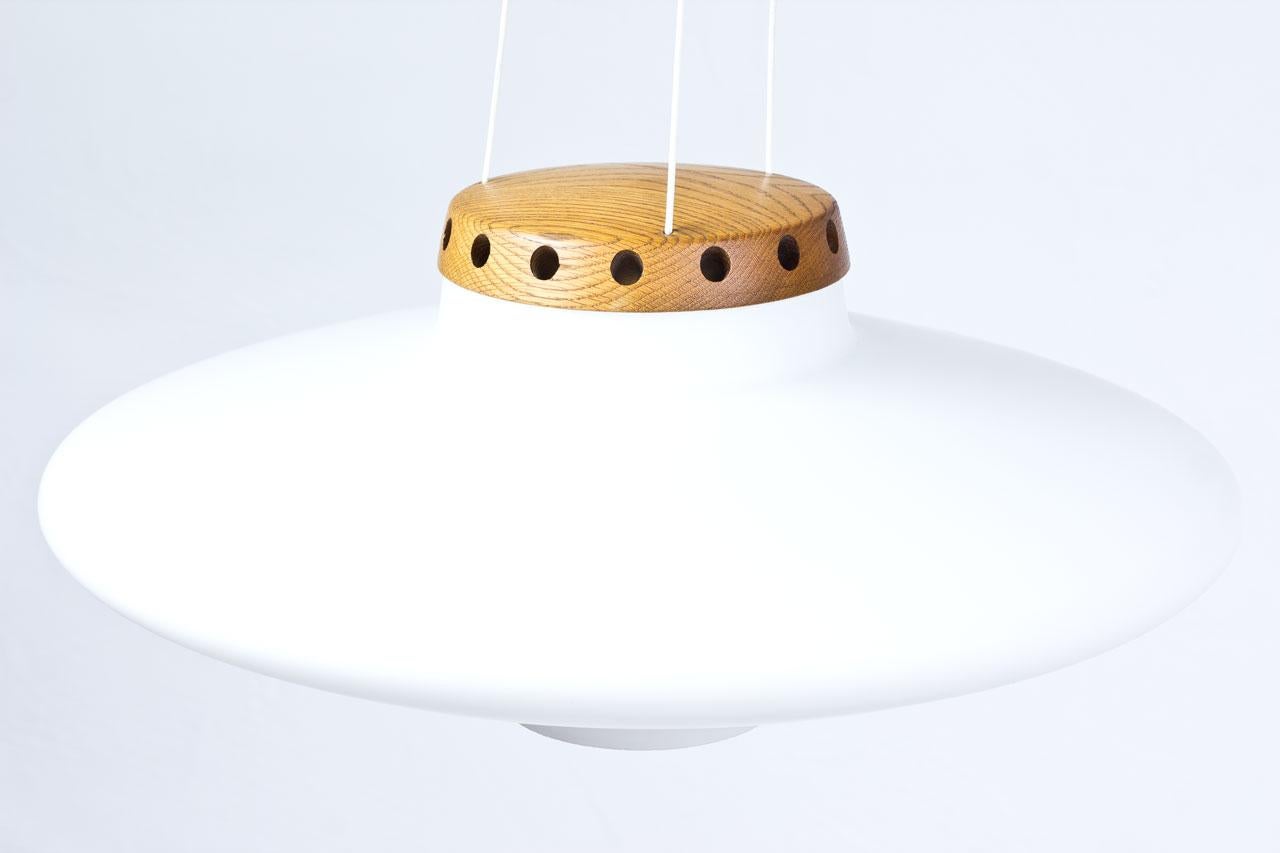 Scandinavian Modern Opaline and Oak Pendant Lamp by Uno & Östen Kristiansson for Luxus, Sweden