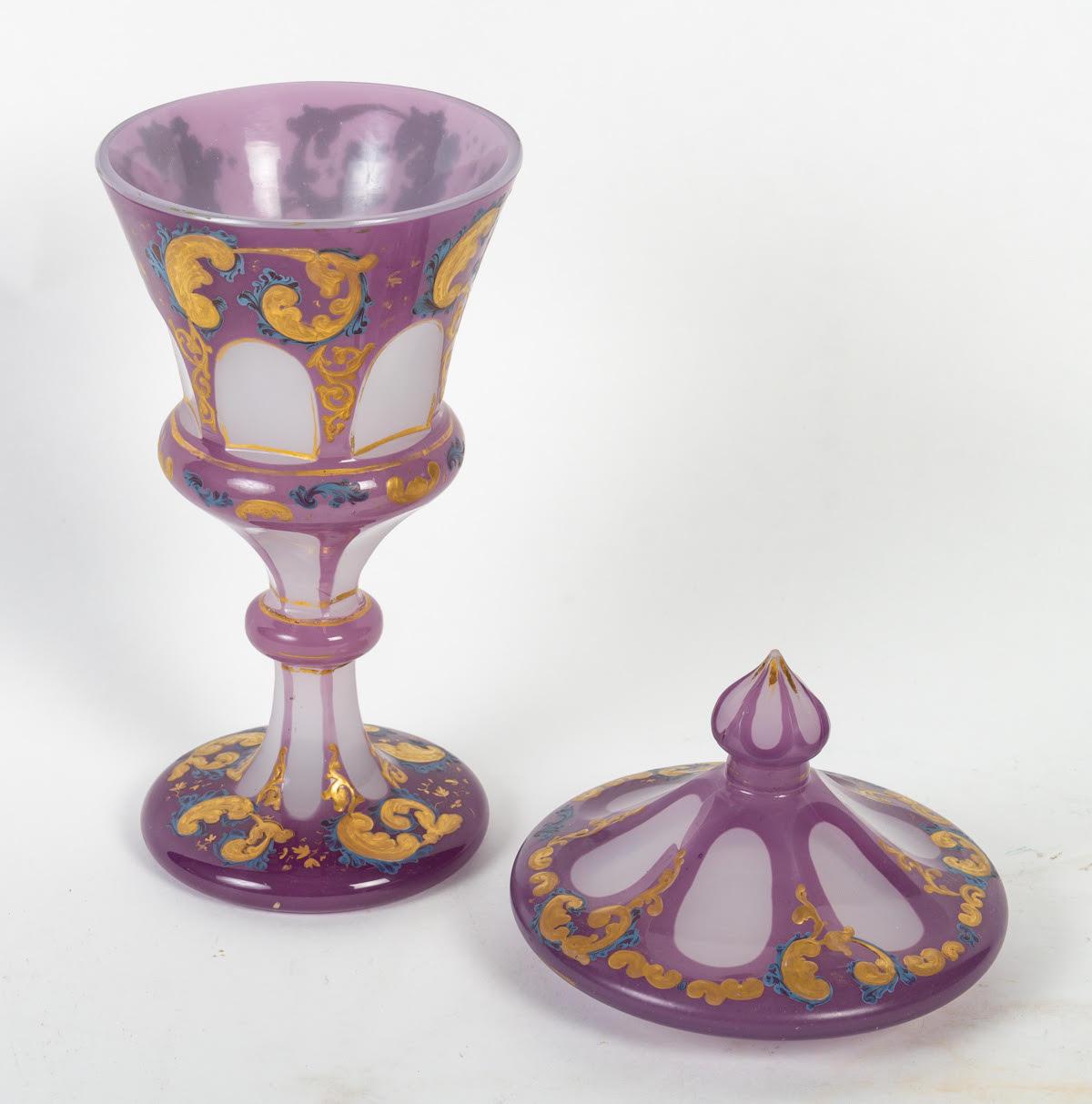 Opaline Overlay Covered Tumbler, 19th Century.

Napoleon III period gold-enameled covered goblet, 19th century in Opaline Overlay, circa 1850.

Dimensions: h: 29cm, d: 13,5cm