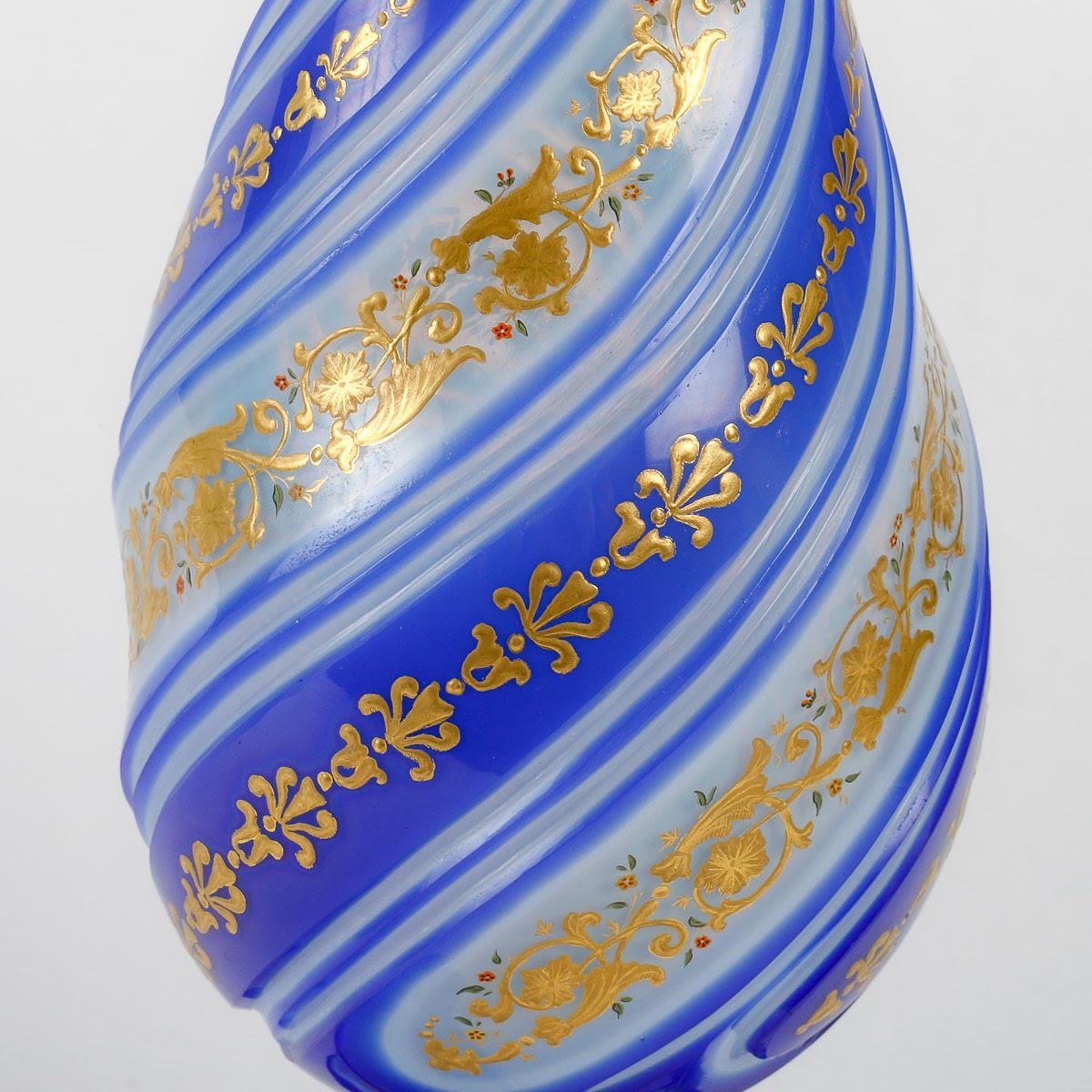 Opaline Overlay Vase, Gold Enamelled, Napoleon III period.

Gold enamelled Opaline Overlay vase, 19th century, Napoleon III period.  
h: 33,5cm , d: 14cm