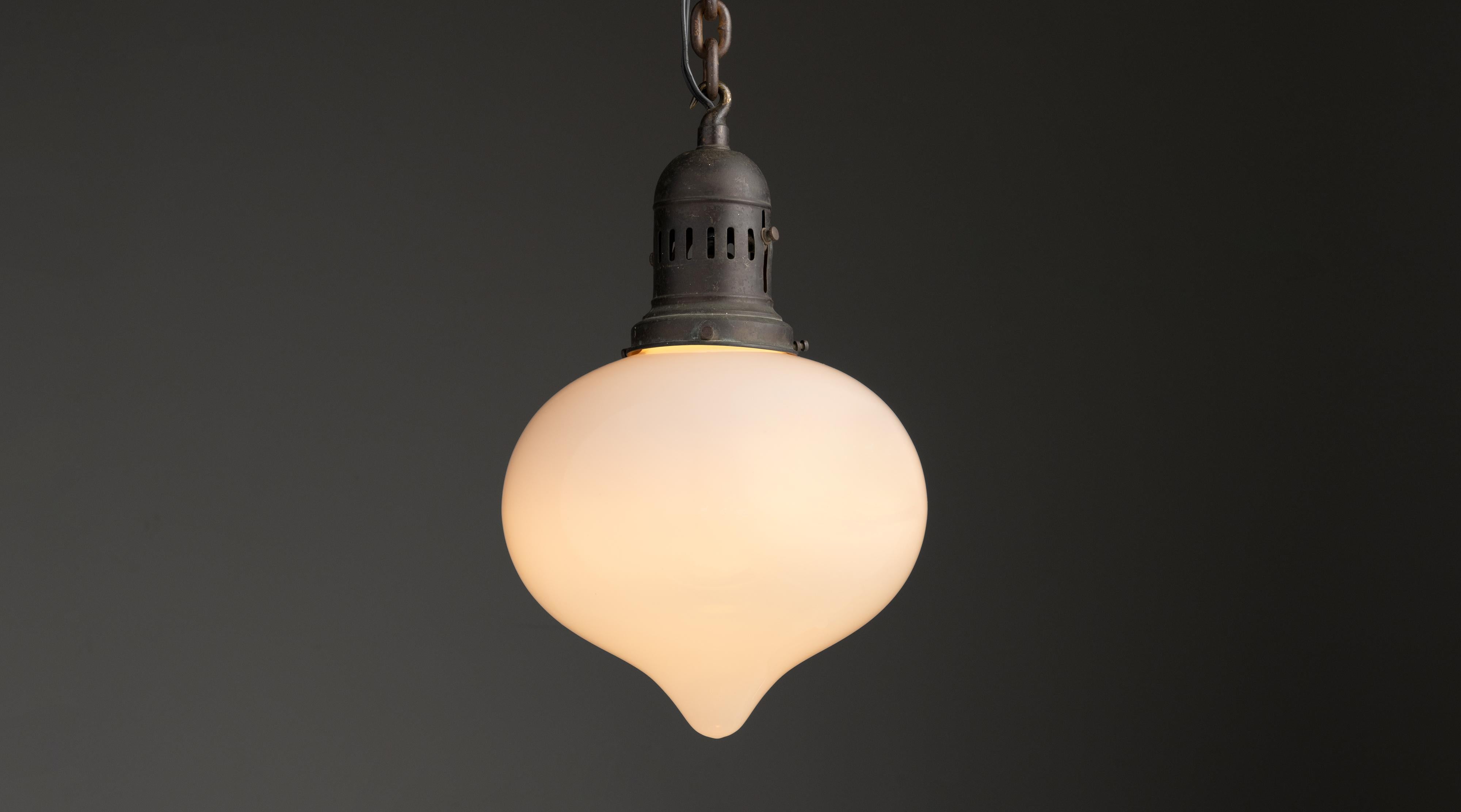 Opaline Teardrop Pendant, England circa 1910

Semi transparent Vaseline glass shade with brass fitter.

10