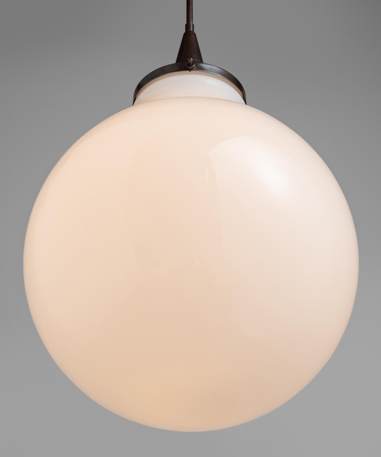 Opaline Teardrop Pendant
Made in Italy
Large opaline glass shade with brass hardware.
14”dia x 27.5