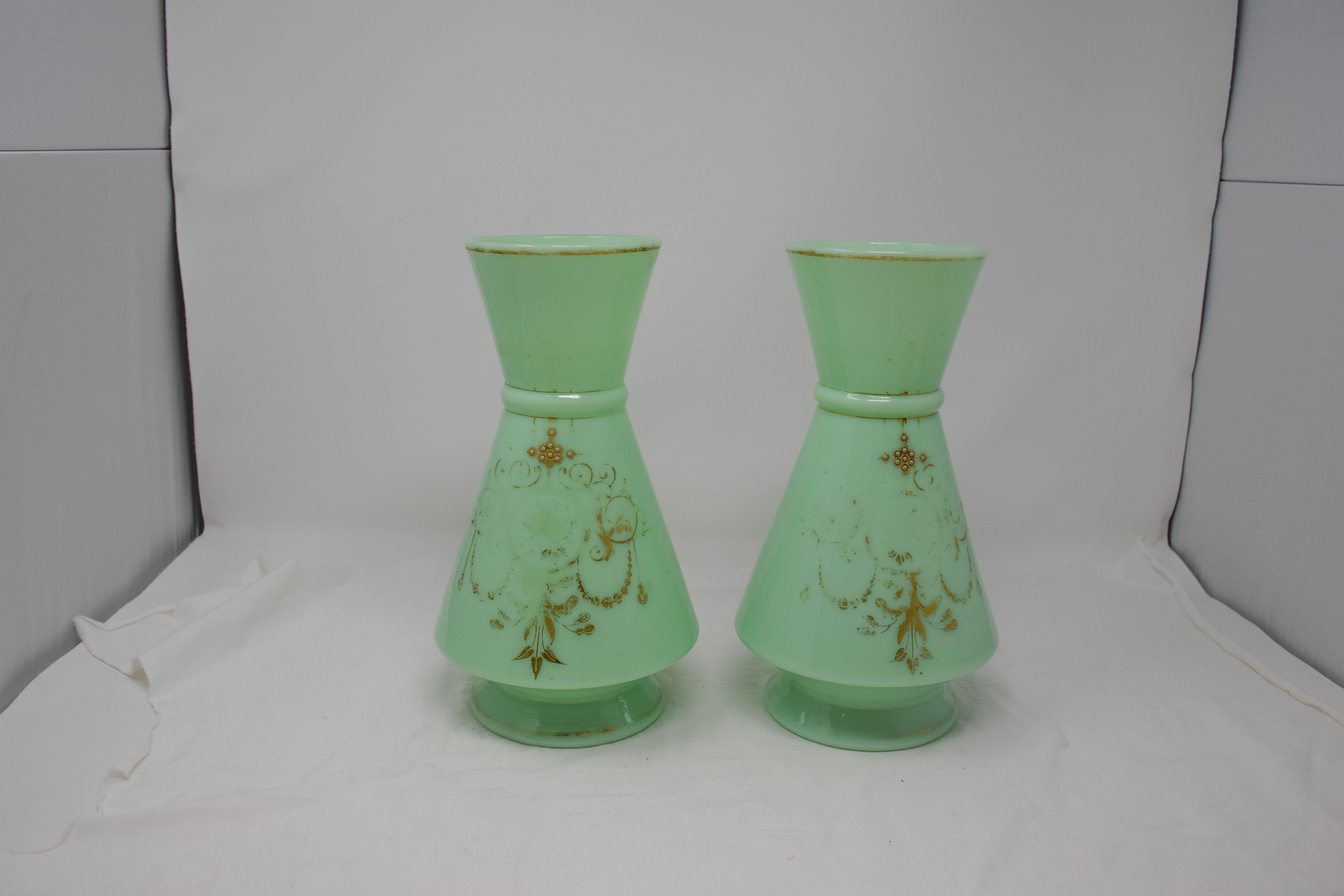 Opaline green glass set of 2. From France. Beautiful pair to use as a stand alone decoration or in the traditional manner with flowers.