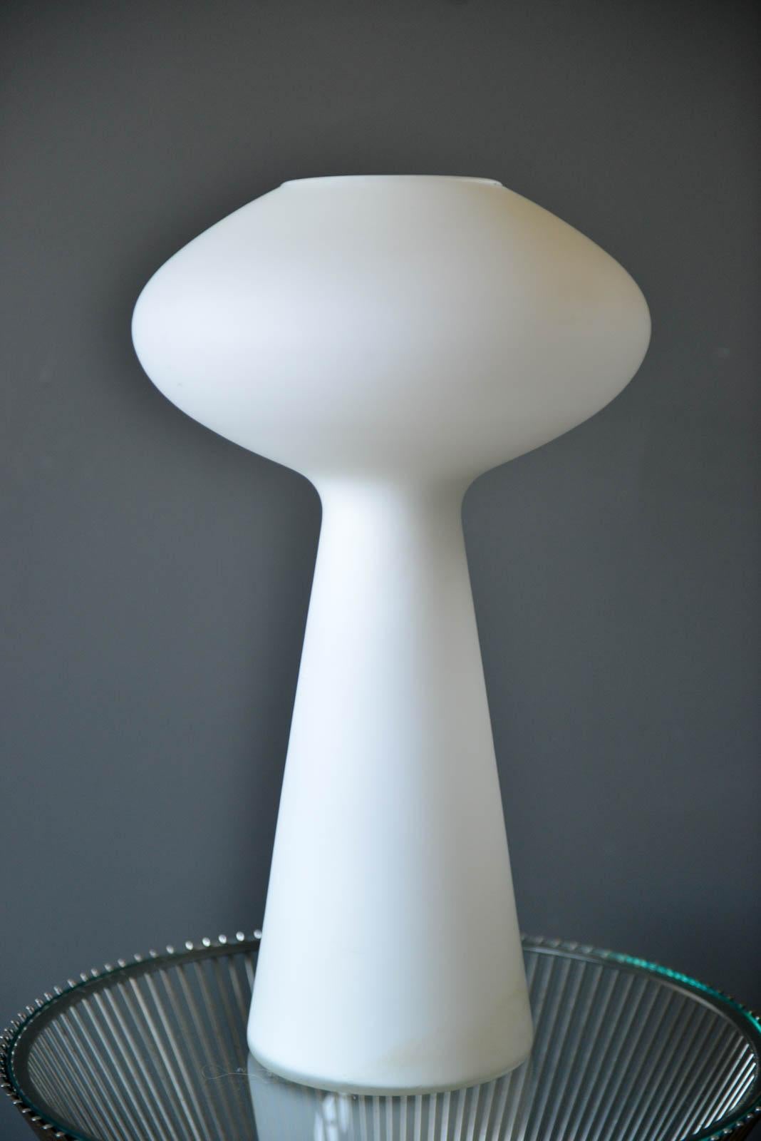 Opaque blown glass lamp by Lisa Johansson-Pape of Finland. A stunning table lamp designed by Lisa Johansson-Pape of Finland in 1960. Beautiful frosted opaque glass in a lovely soft mushroom shape. Emits beautiful soft light, looks amazing on your