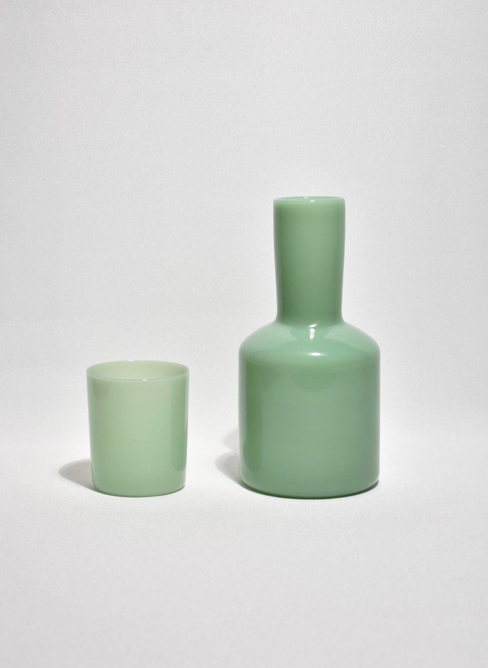 Opaque mint carafe set by Maison Balzac inspired by the traditional sets used in France and displayed on a bedside table at night. 

Food grade colored glass, individually mouth blown. 
Heat and cold resistant.
Hand wash