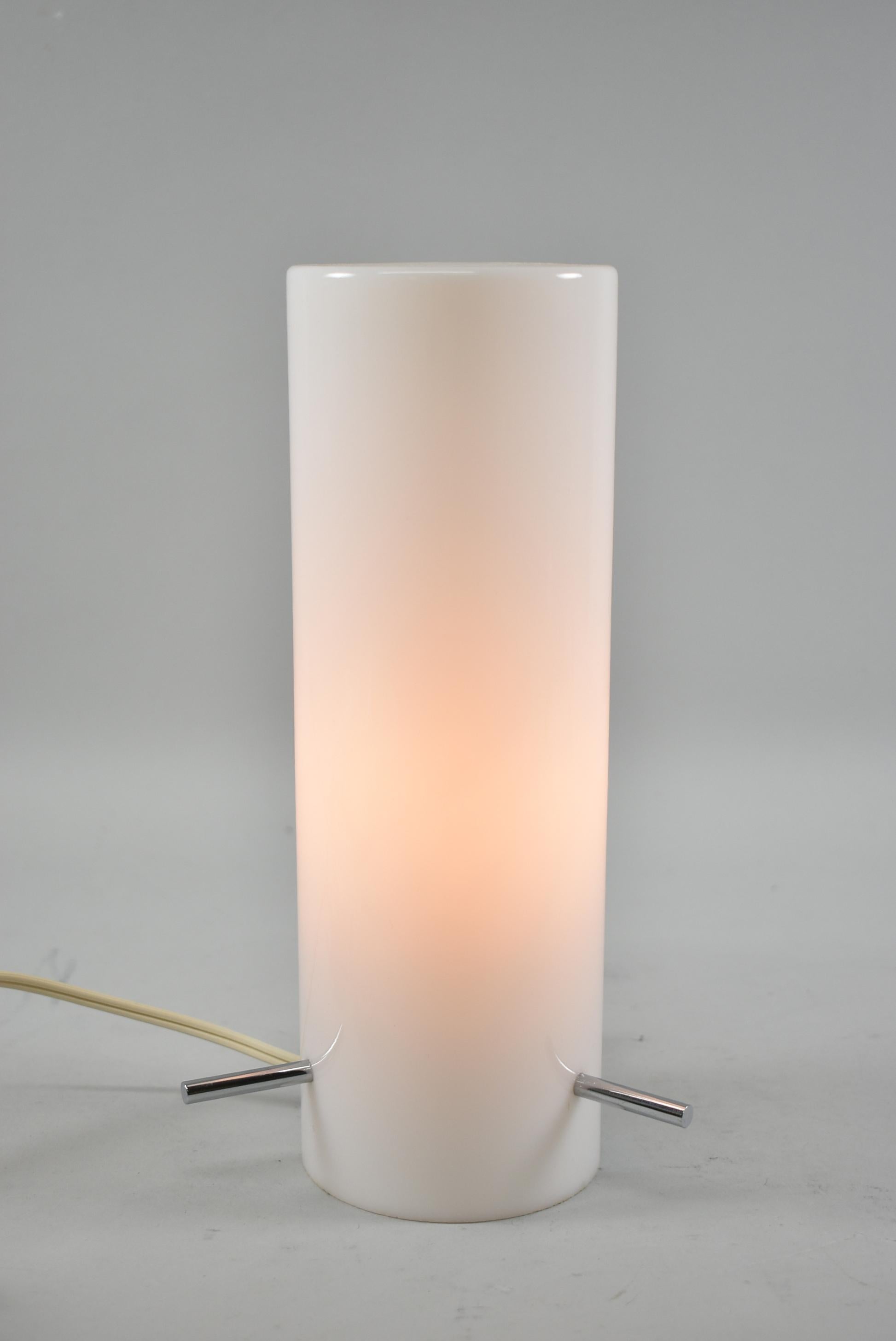 Vintage opaque white glass cylinder shade table lamp attributed to Stilnoro. Single socket.