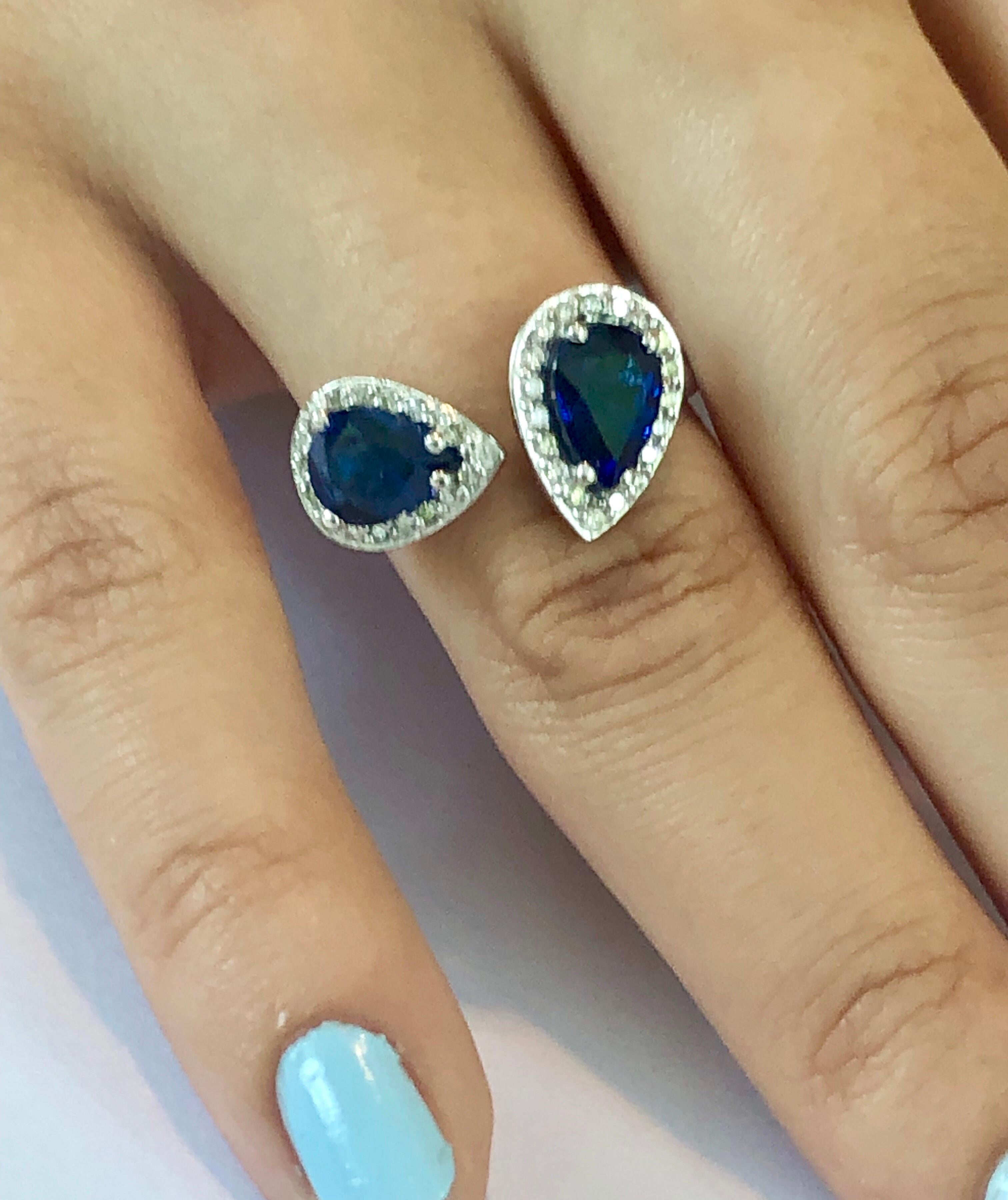 Round Cut Two Pear Shape Sapphires and Cluster Diamond Open Shank Cocktail Ring