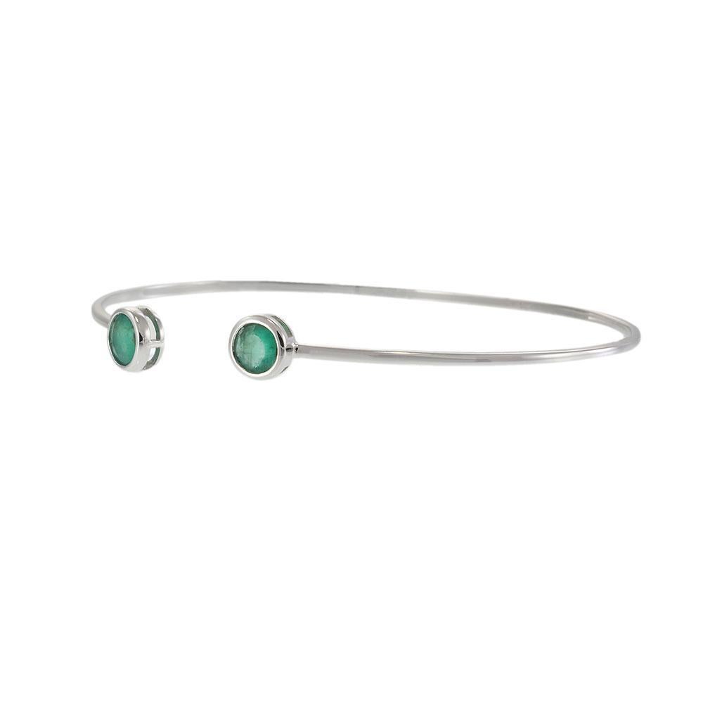 Modern Open Bangle with Round Bezel-Set Emeralds in 18KT White Gold For Sale