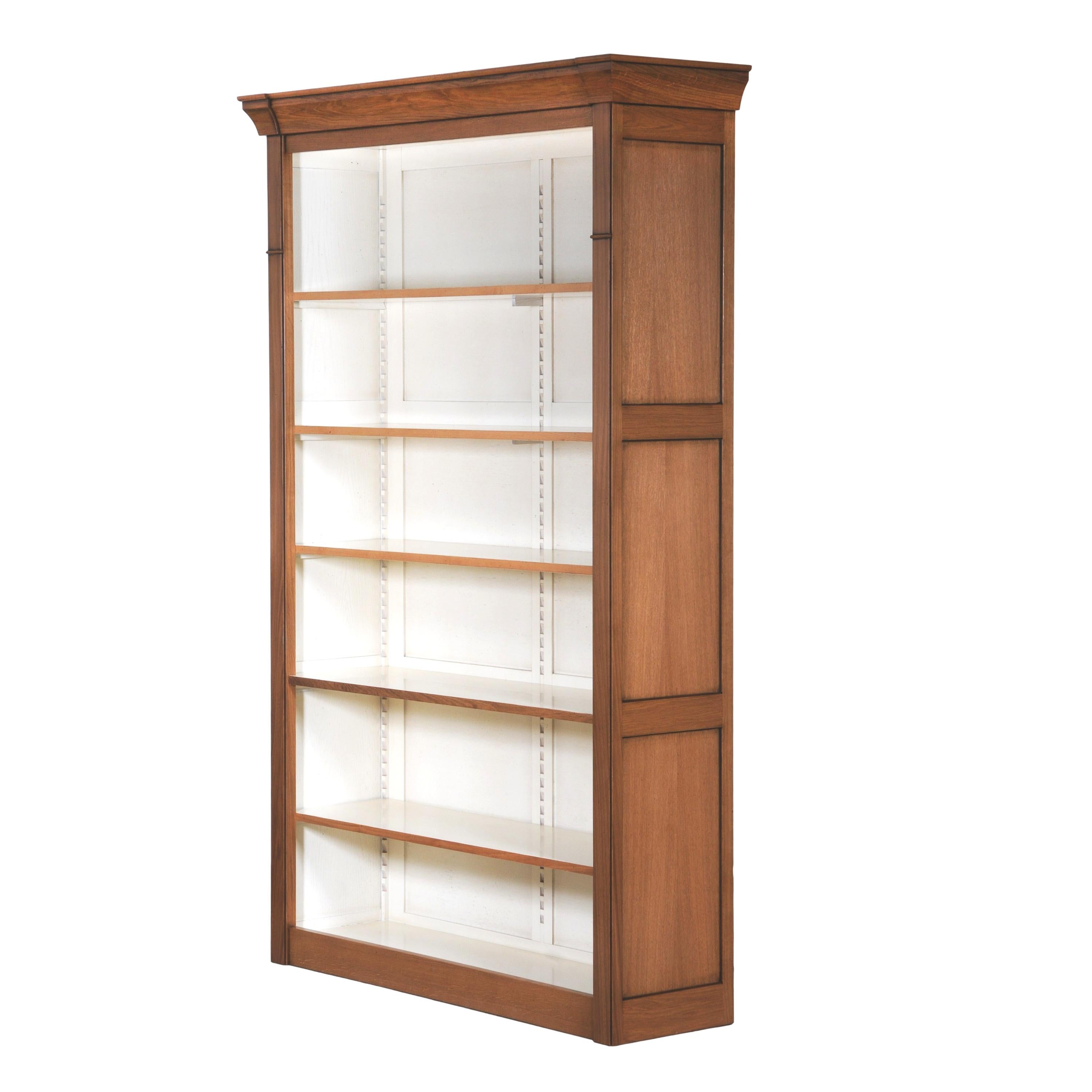 This classical bookcase Unit is made of French Oak. It can be combined with other units to get a full wall of bookcases.

This unit has one fixed wooden shelf + 3 removable and adjustable shelves wooden racks

Inside dimensions are : Length 140