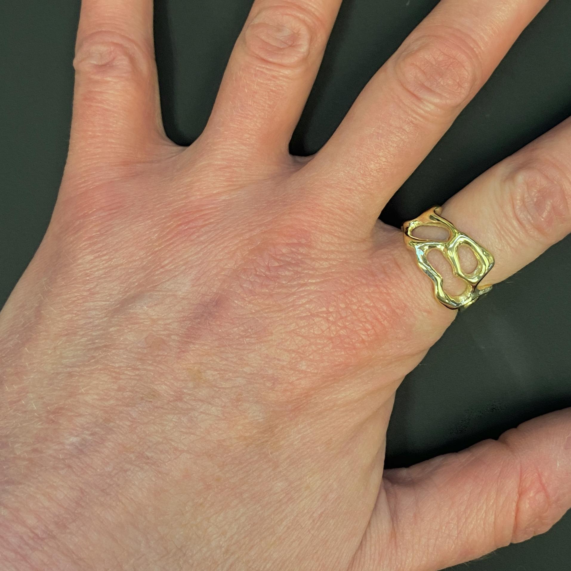 This ring is a design Eytan made years ago and is now revisiting.  It feels great on the finger and, with no defined top or bottom, front or back, you can turn this ring any which way you like; it looks great from every angle.  In high-polish 14