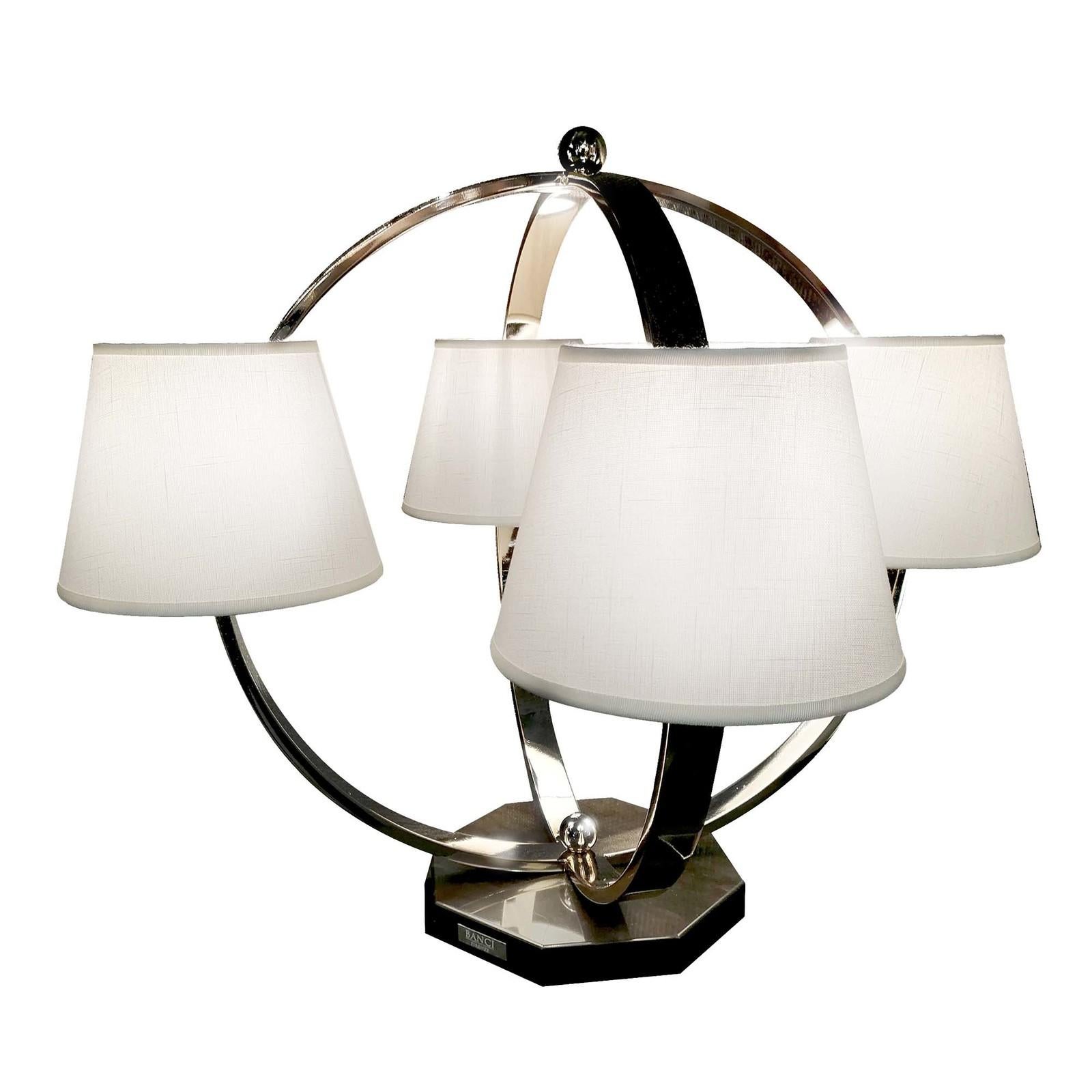 Open circle 4-light table lamp.