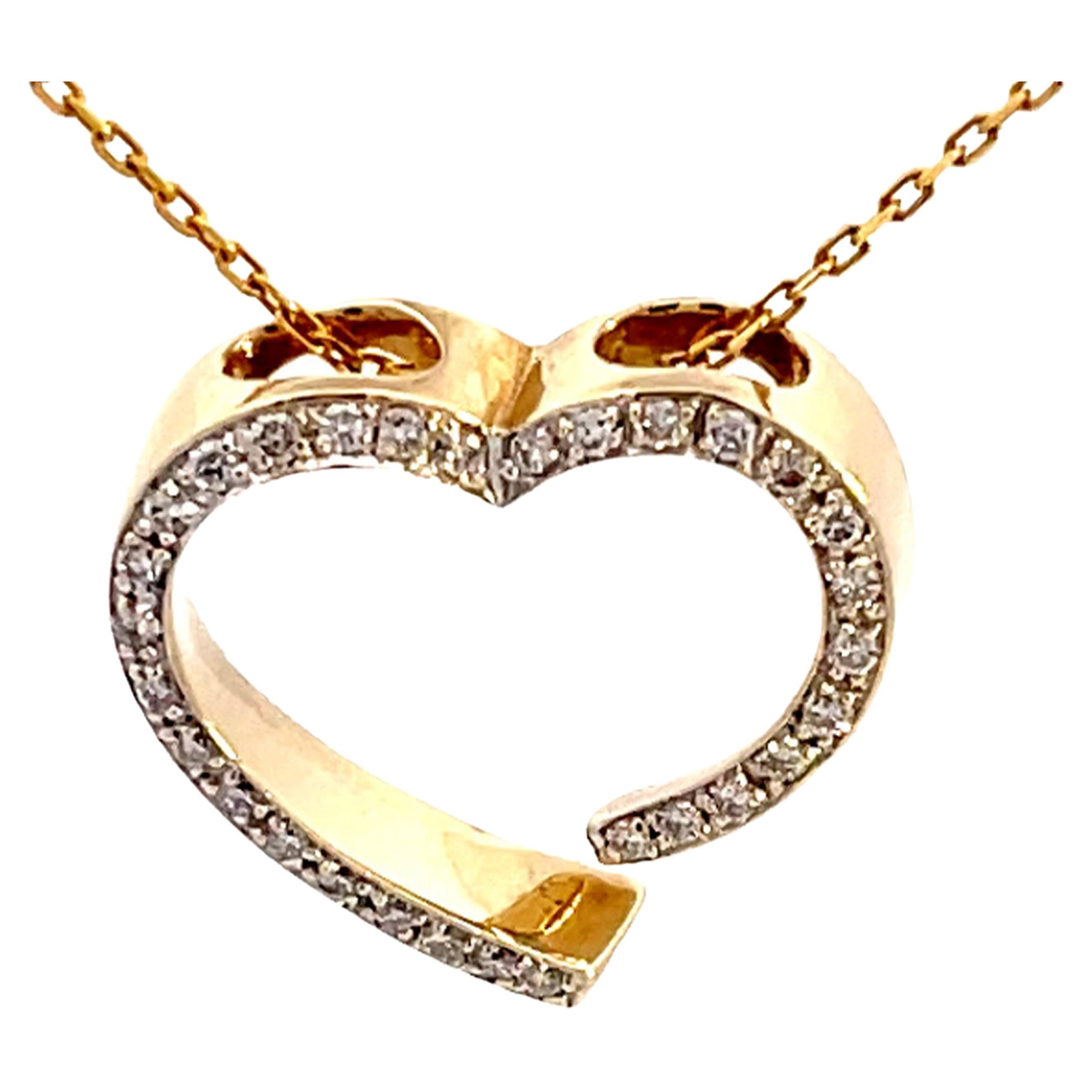 Pendentif coeur ouvert en or jaune 14k avec chaîne en vente