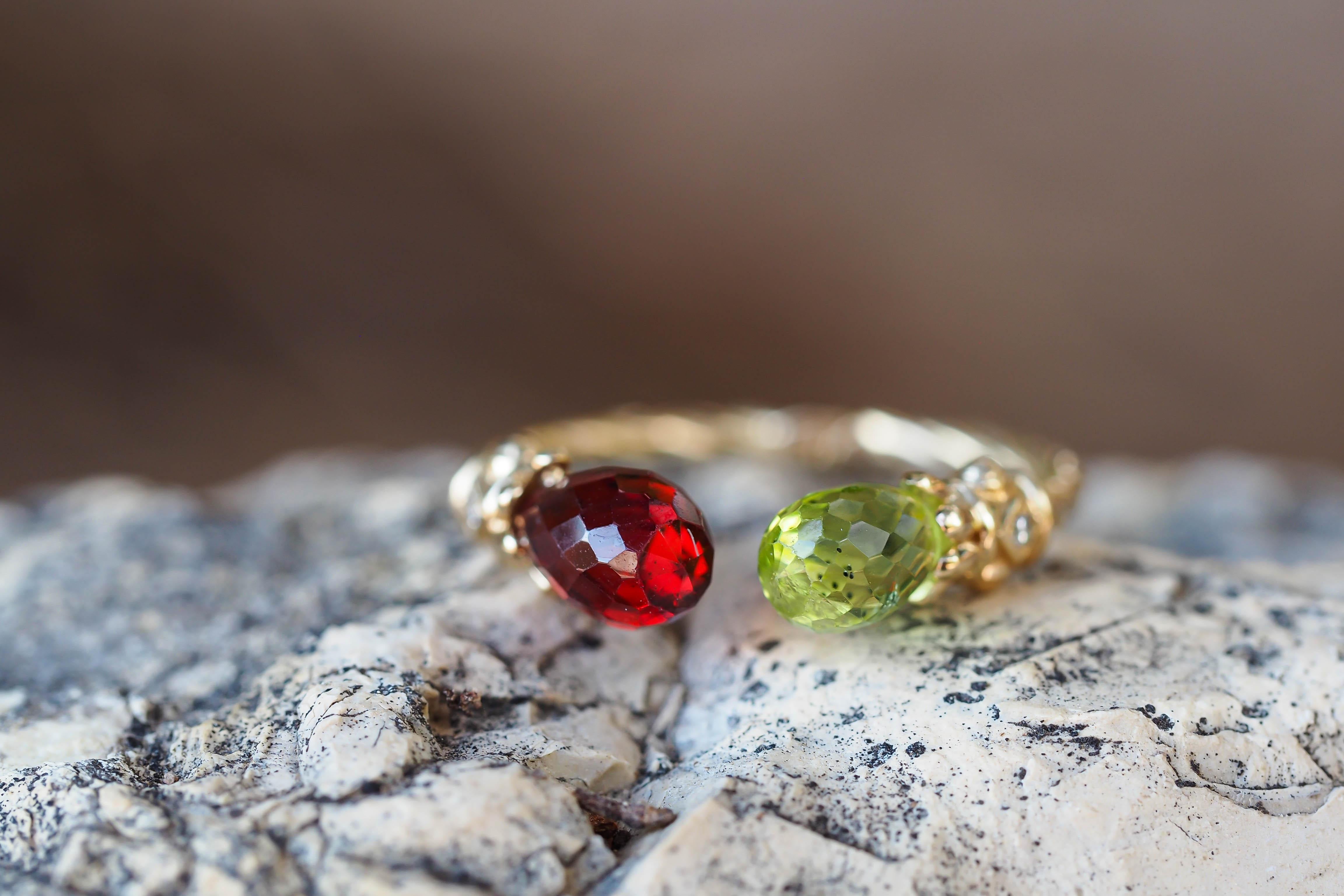 For Sale:   Open ended gold ring with peridot, garnet and diamonds 10
