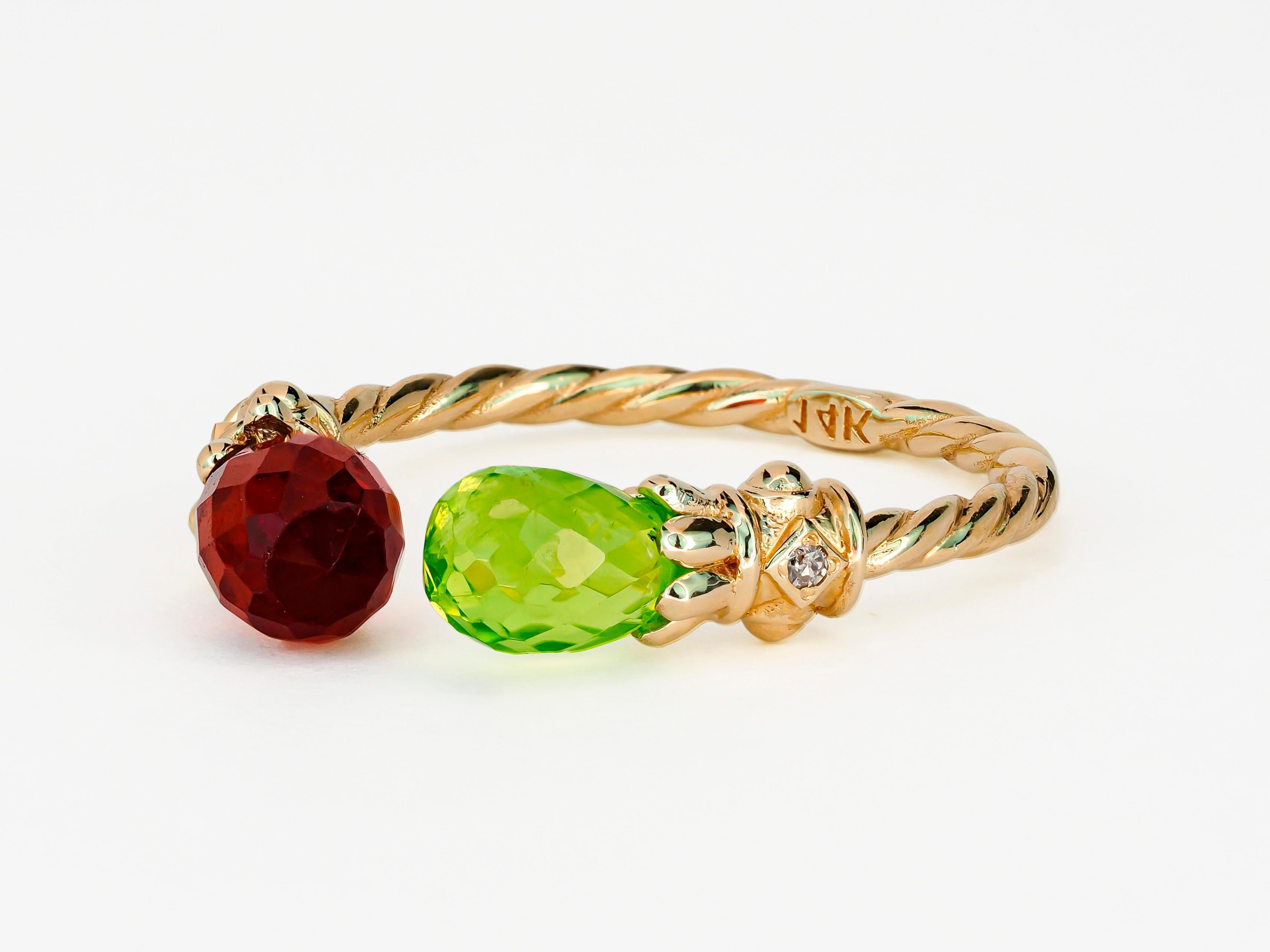 For Sale:   Open ended gold ring with peridot, garnet and diamonds 13