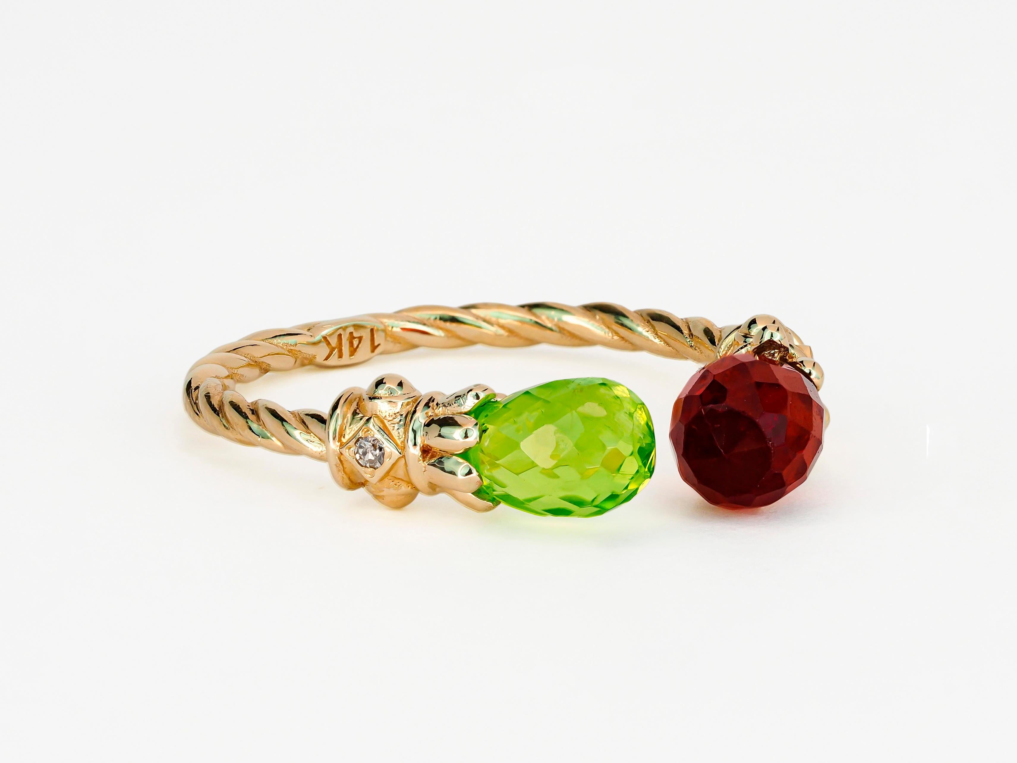 For Sale:  Open ended gold ring with peridot, garnet and diamonds 14