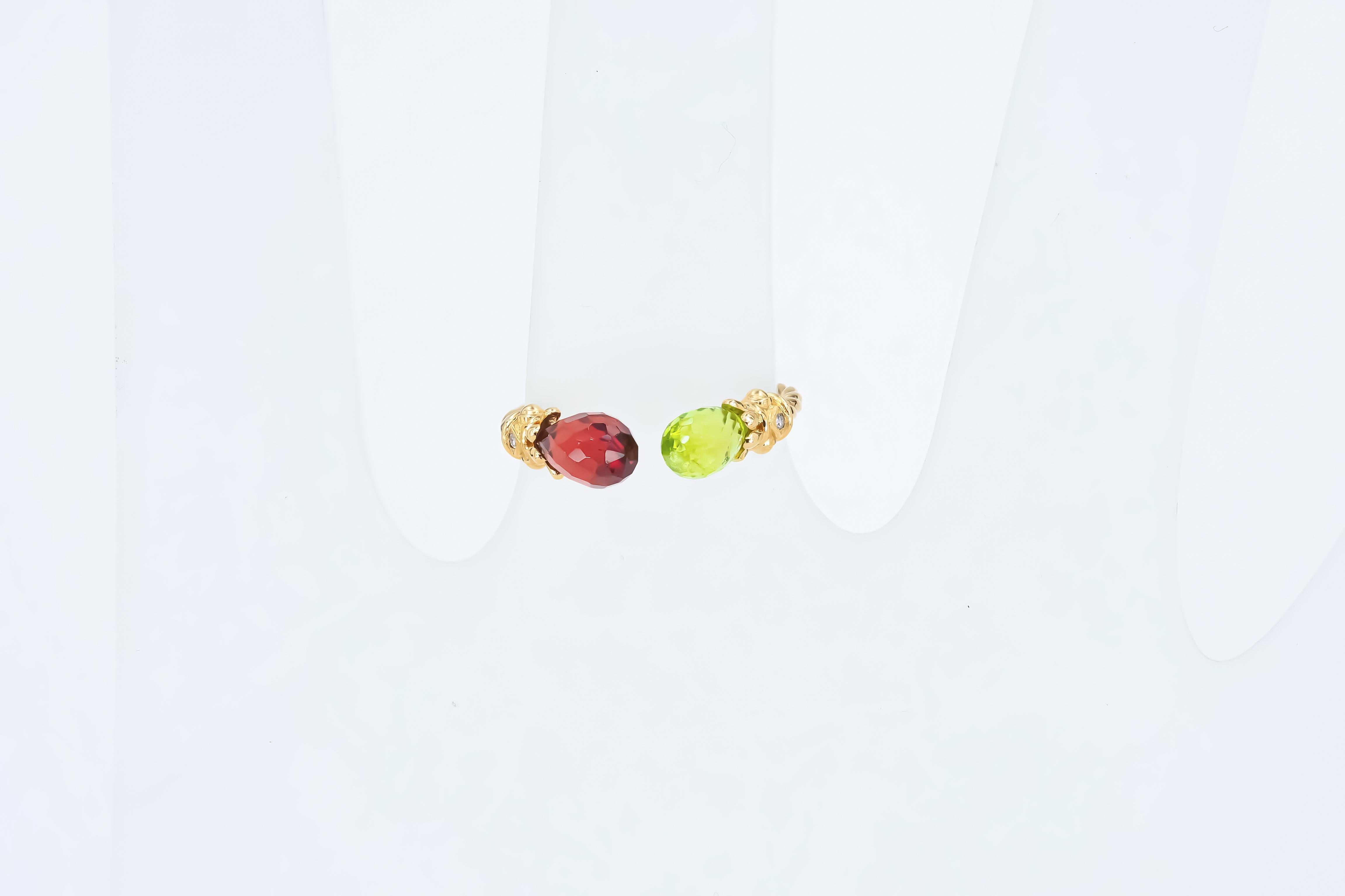For Sale:   Open ended gold ring with peridot, garnet and diamonds 7
