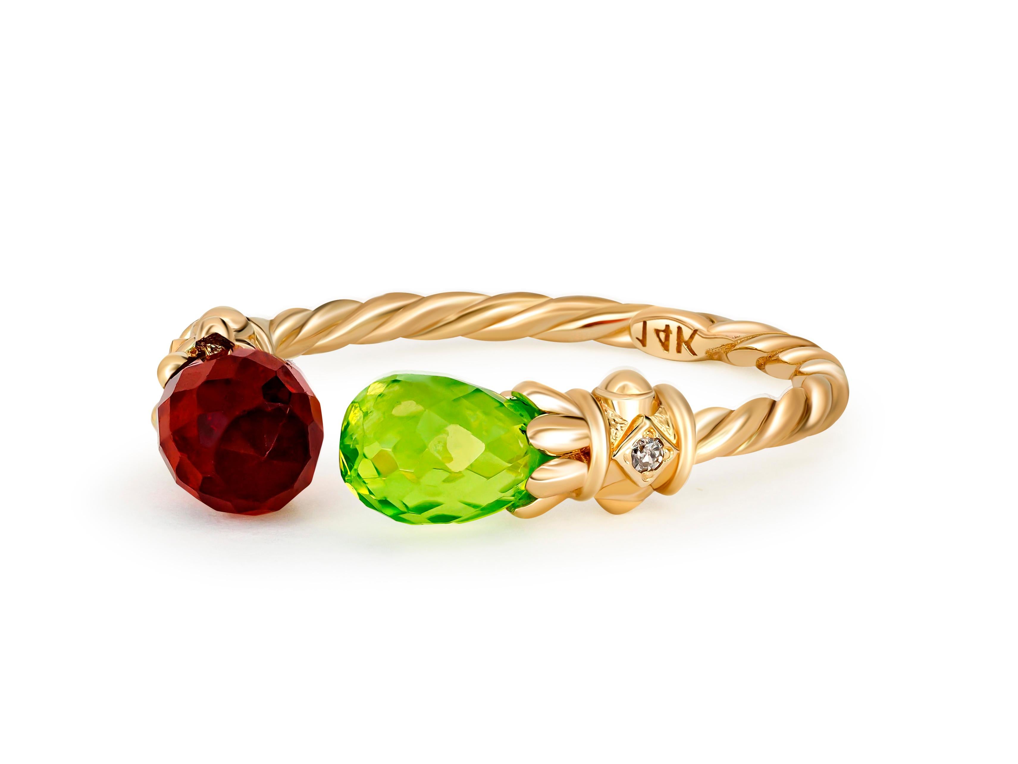 Open ended peridot, amethyst 14k gold ring. 
Briolette gem gold ring. Garnet gold ring. Peridot gold ring. Adjustable gold ring.

Total weight: 2.60 g. depends from choosen size
Metal: 14k gold.

Stones:
Peridot:
Cut: Briolette
Weight: approx 1.0