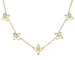 Open Flower Motif Station Necklace with Diamonds in 18 Karat Yellow Gold