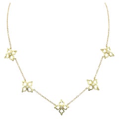 Open Flower Motif Station Necklace with Diamonds in 18 Karat Yellow Gold